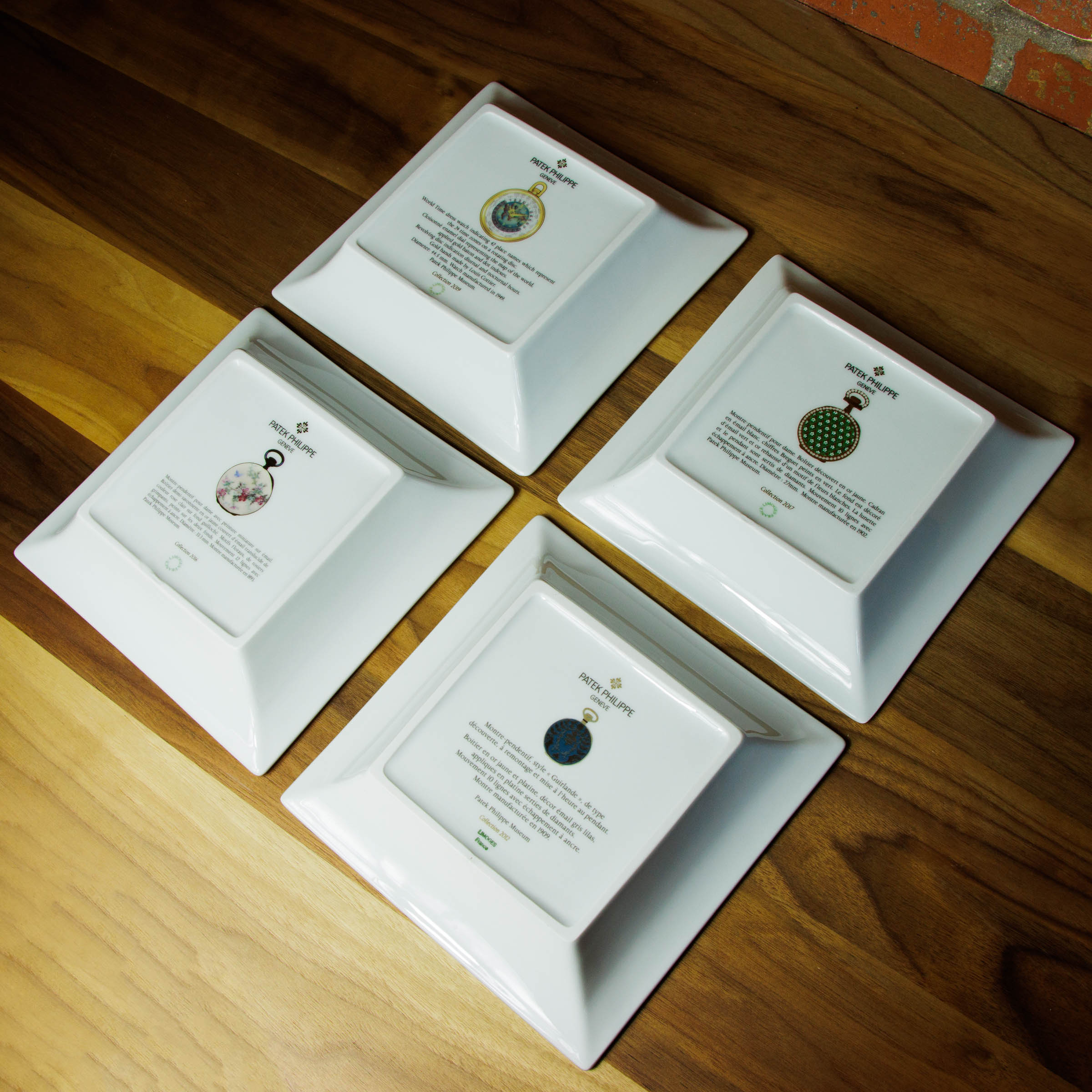 Patek Philippe Lot of Seven Limoges Commemorative Porcelain Dishes