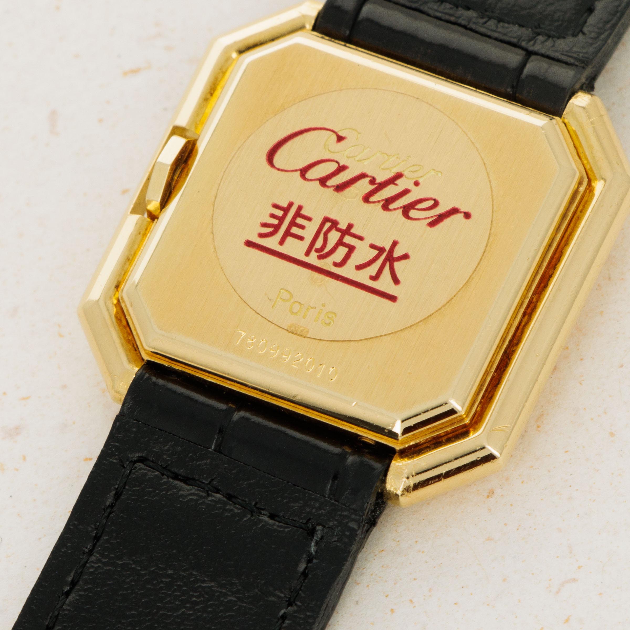 Cartier Tank Ceinture 78099 18k YG Auctions Loupe This