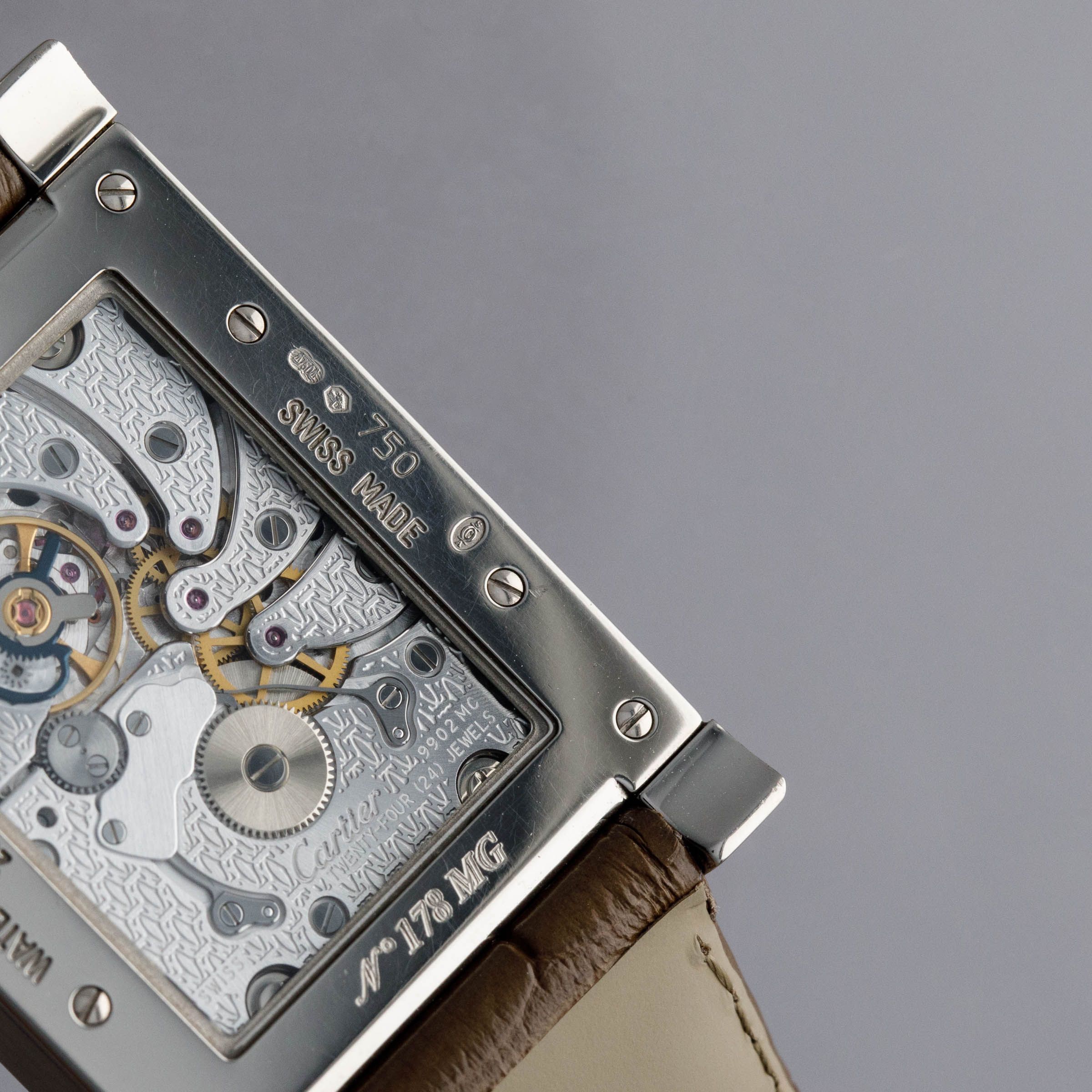 CARTIER CPCP TANK A VIS WANDERING HOURS 2554 18K WG | Auctions