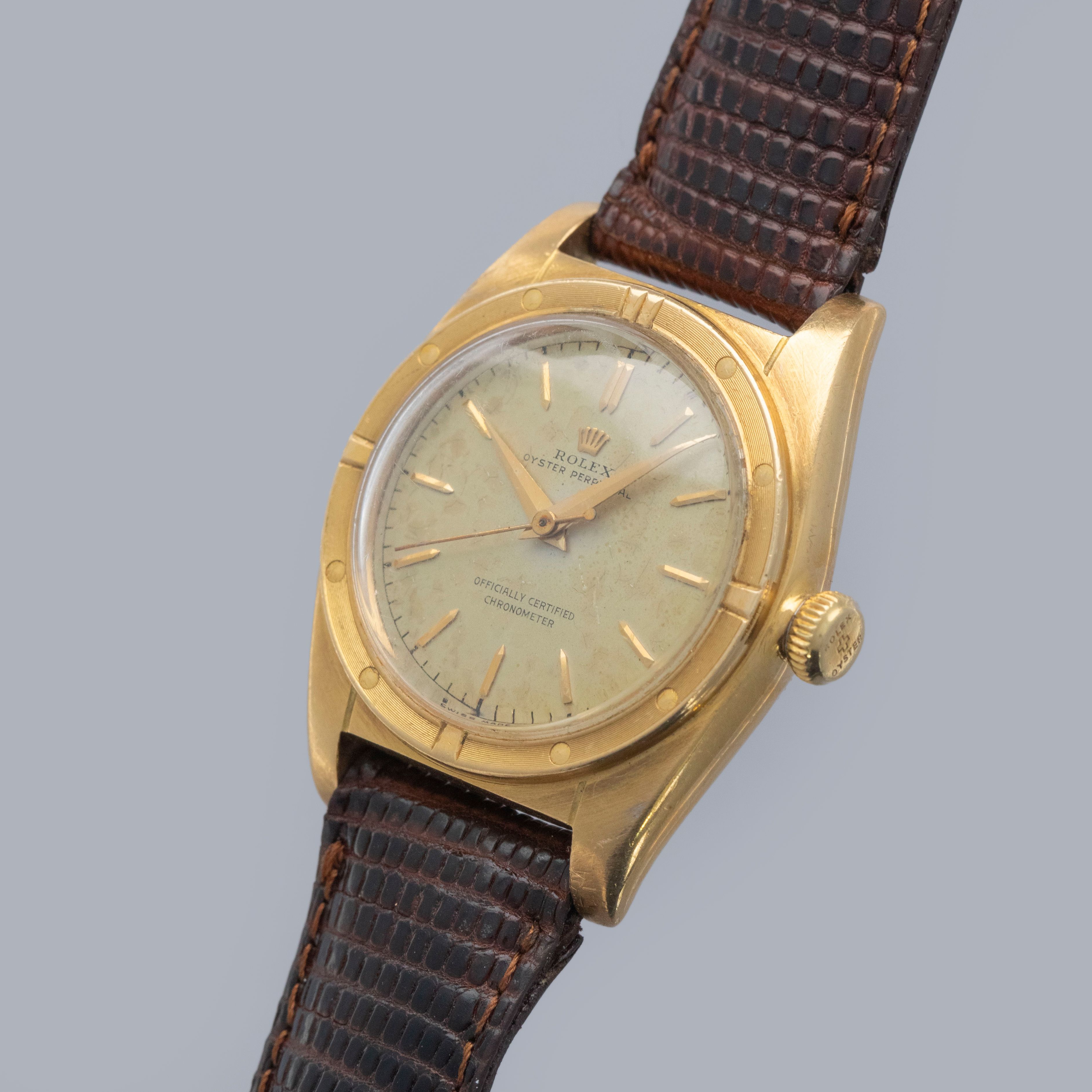 Rolex Oyster Perpetual Bubbleback 5015 18k YG | Auctions | Loupe This