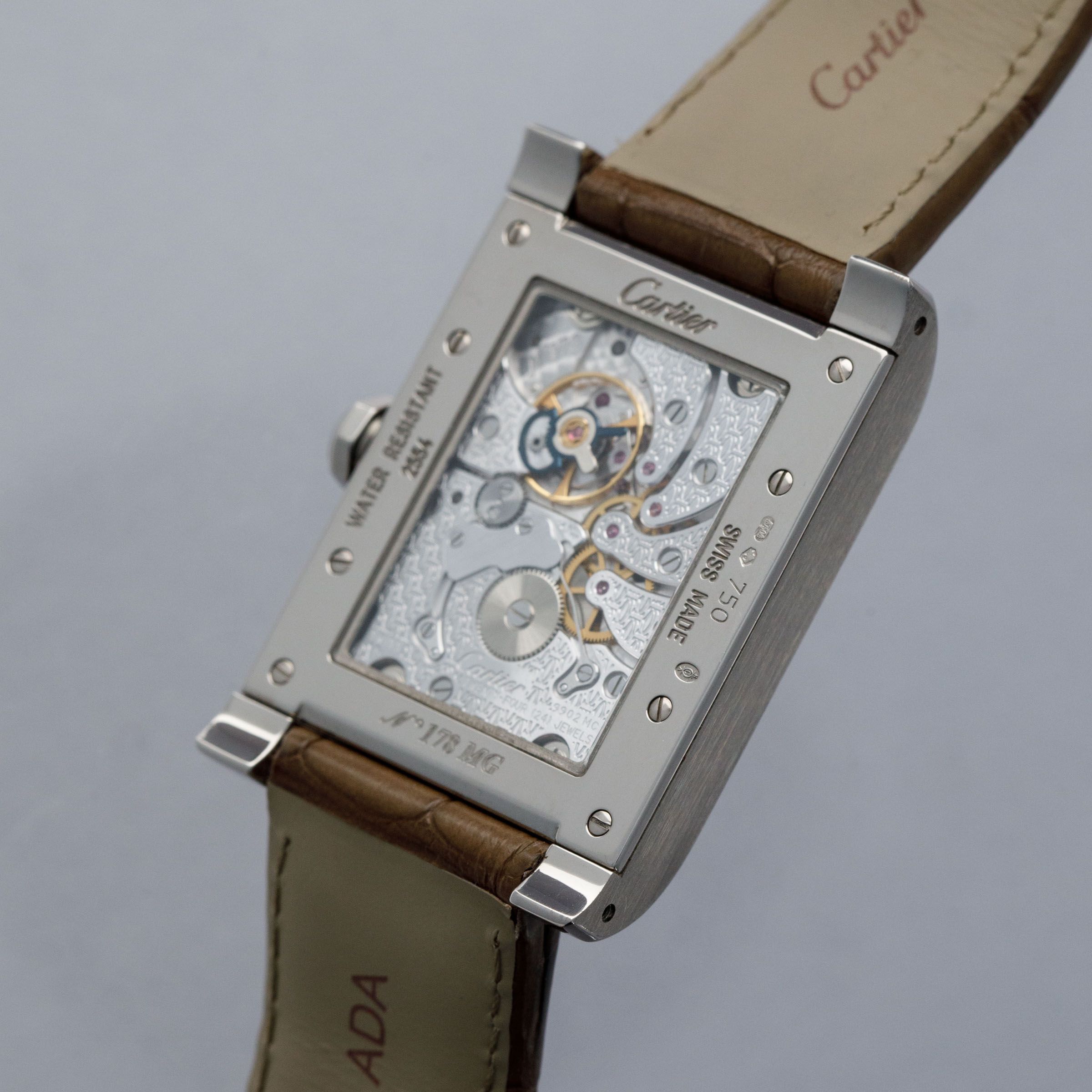 CARTIER CPCP TANK A VIS WANDERING HOURS 2554 18K WG | Auctions