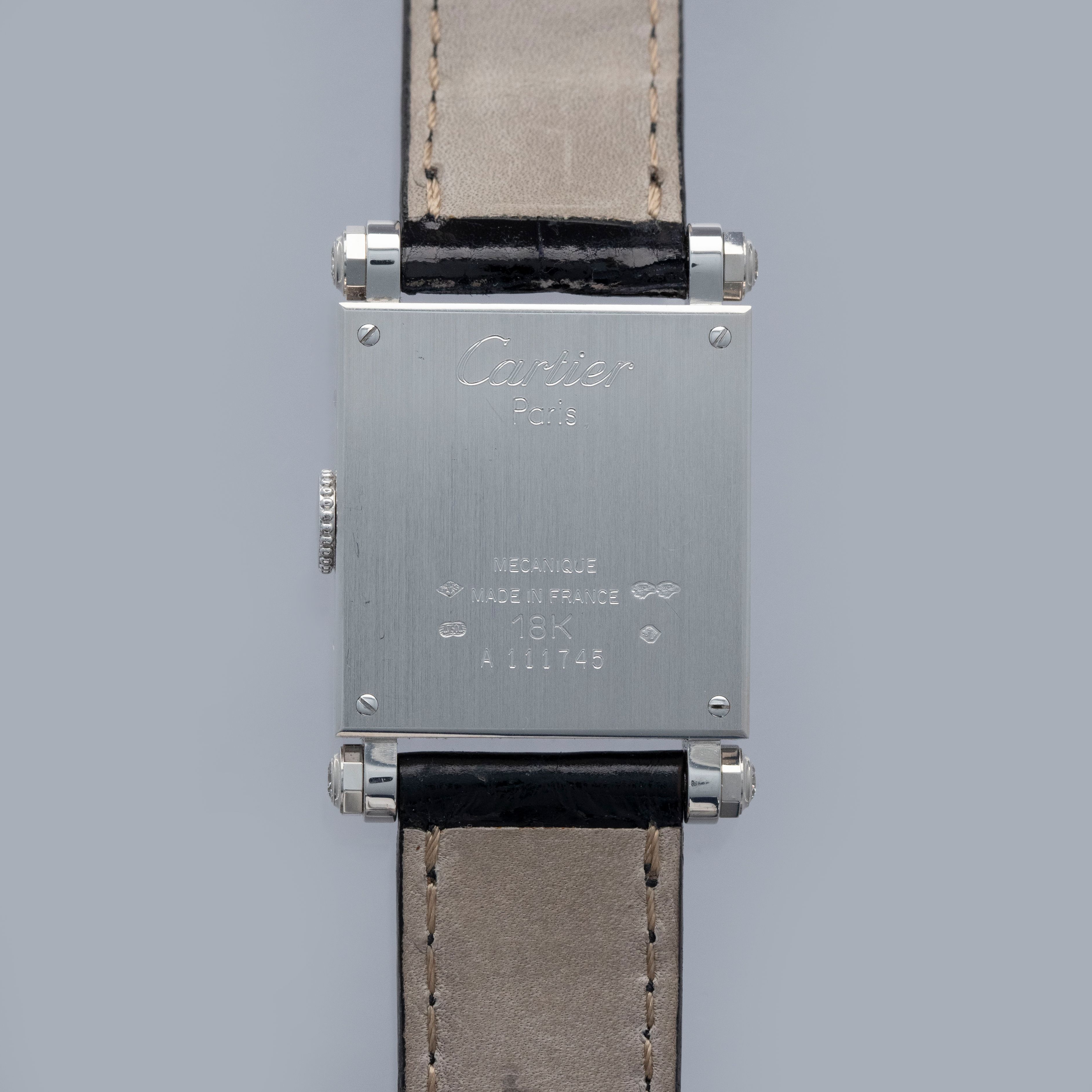 Cartier Rectangulaire A Pattes Vis Armurier 18k WG | Auctions