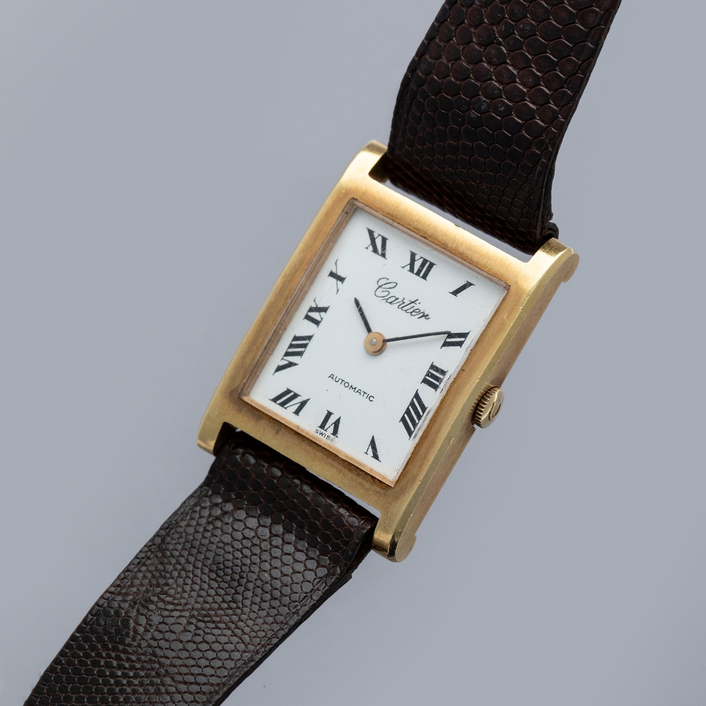 Cartier Tank 124102/3 by Universal Geneve 18k YG | Auctions