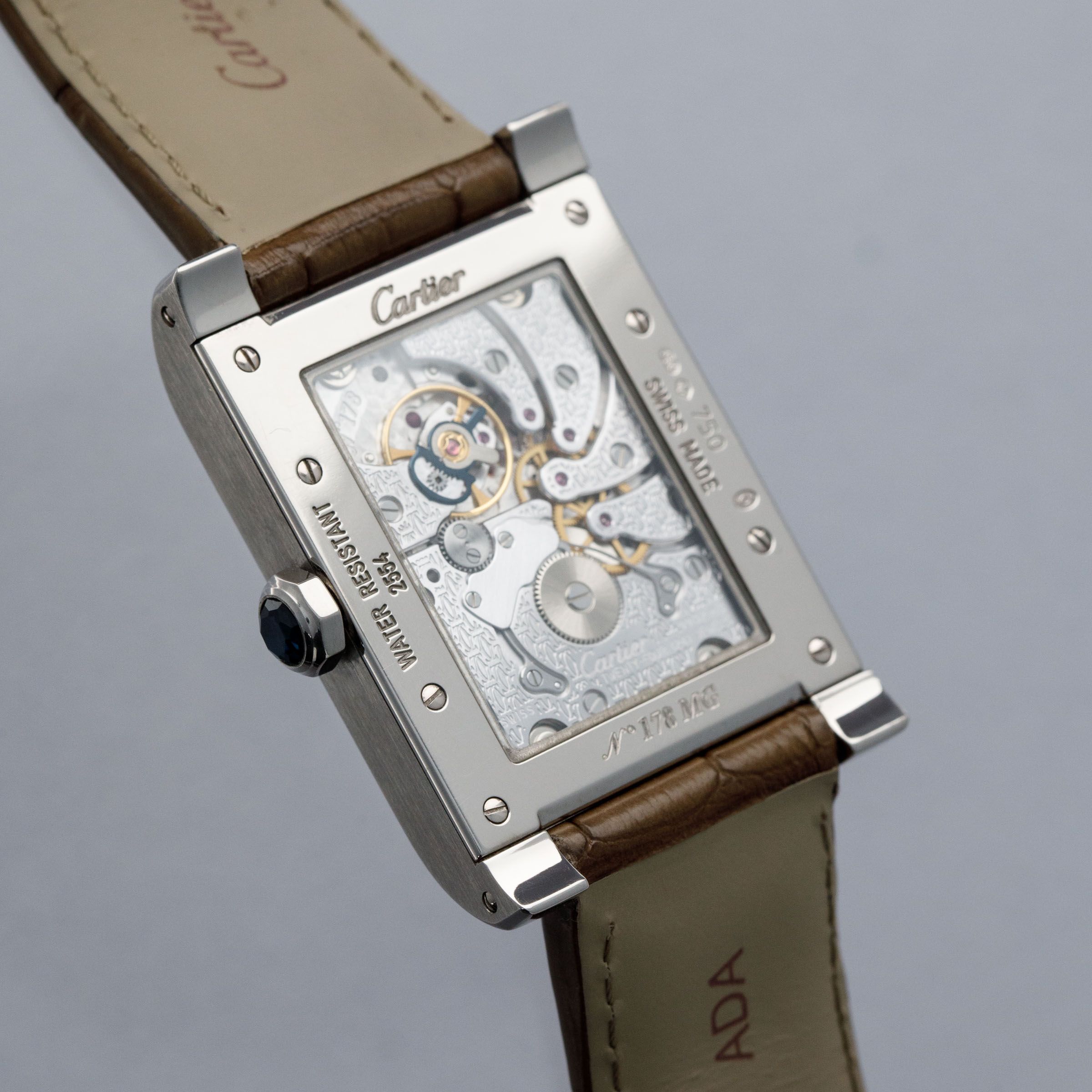 CARTIER CPCP TANK A VIS WANDERING HOURS 2554 18K WG | Auctions