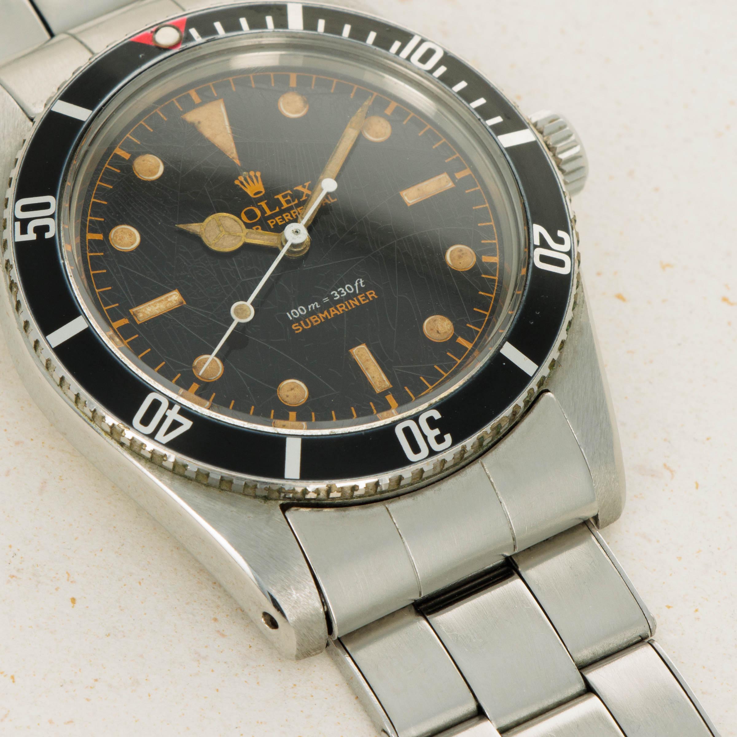 Rolex submariner deals red triangle