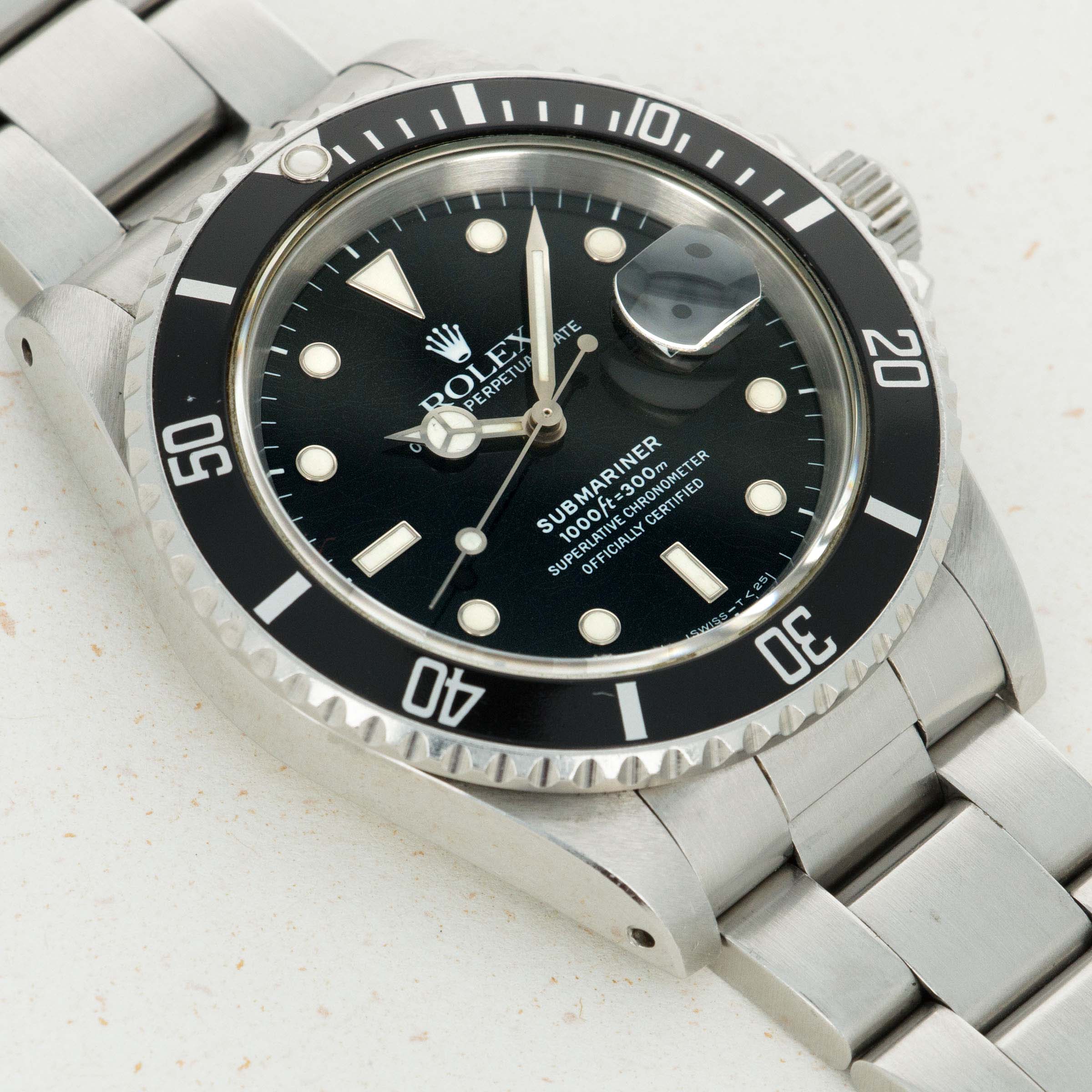 Rolex Submariner 16610 Auctions Loupe This