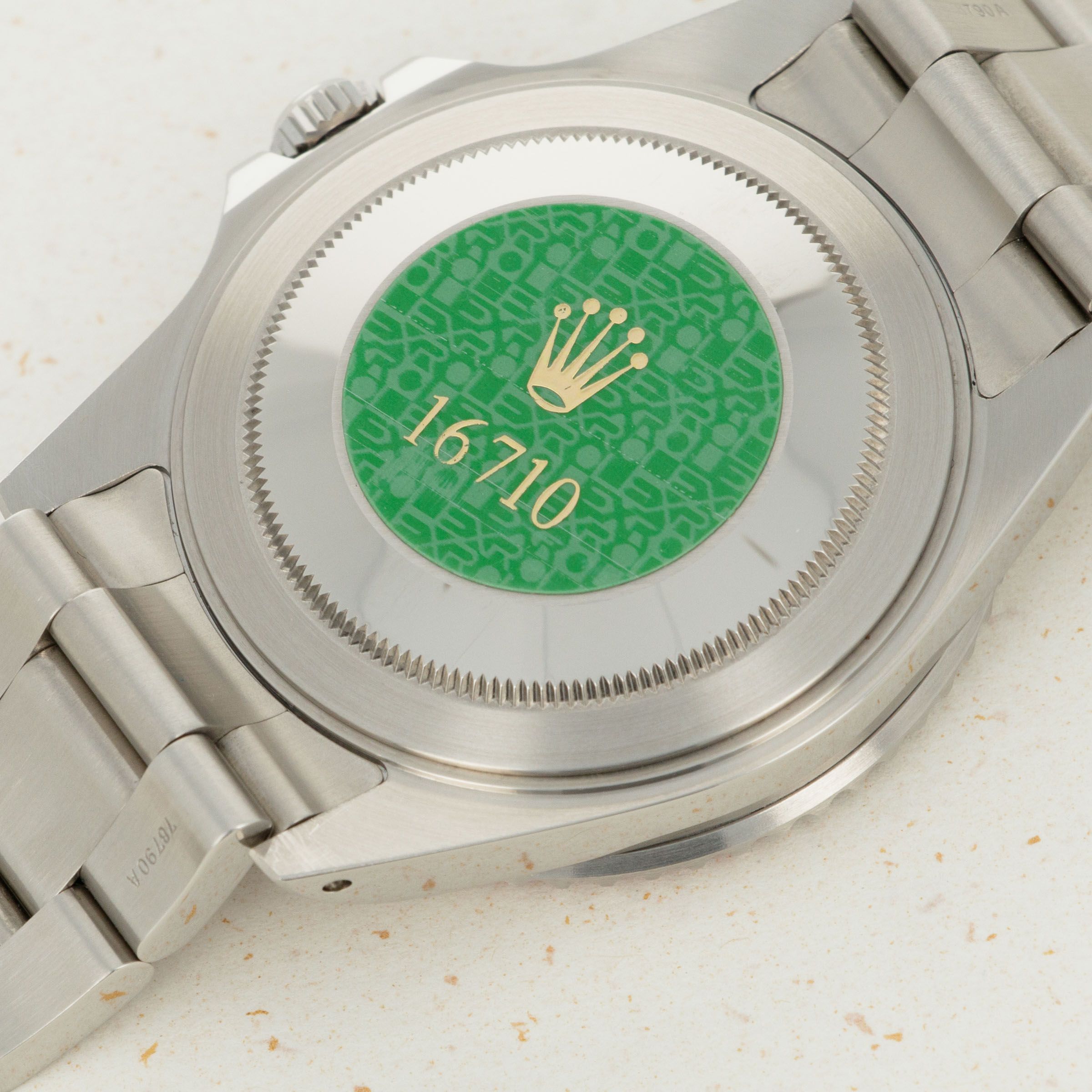 green label on back of rolex