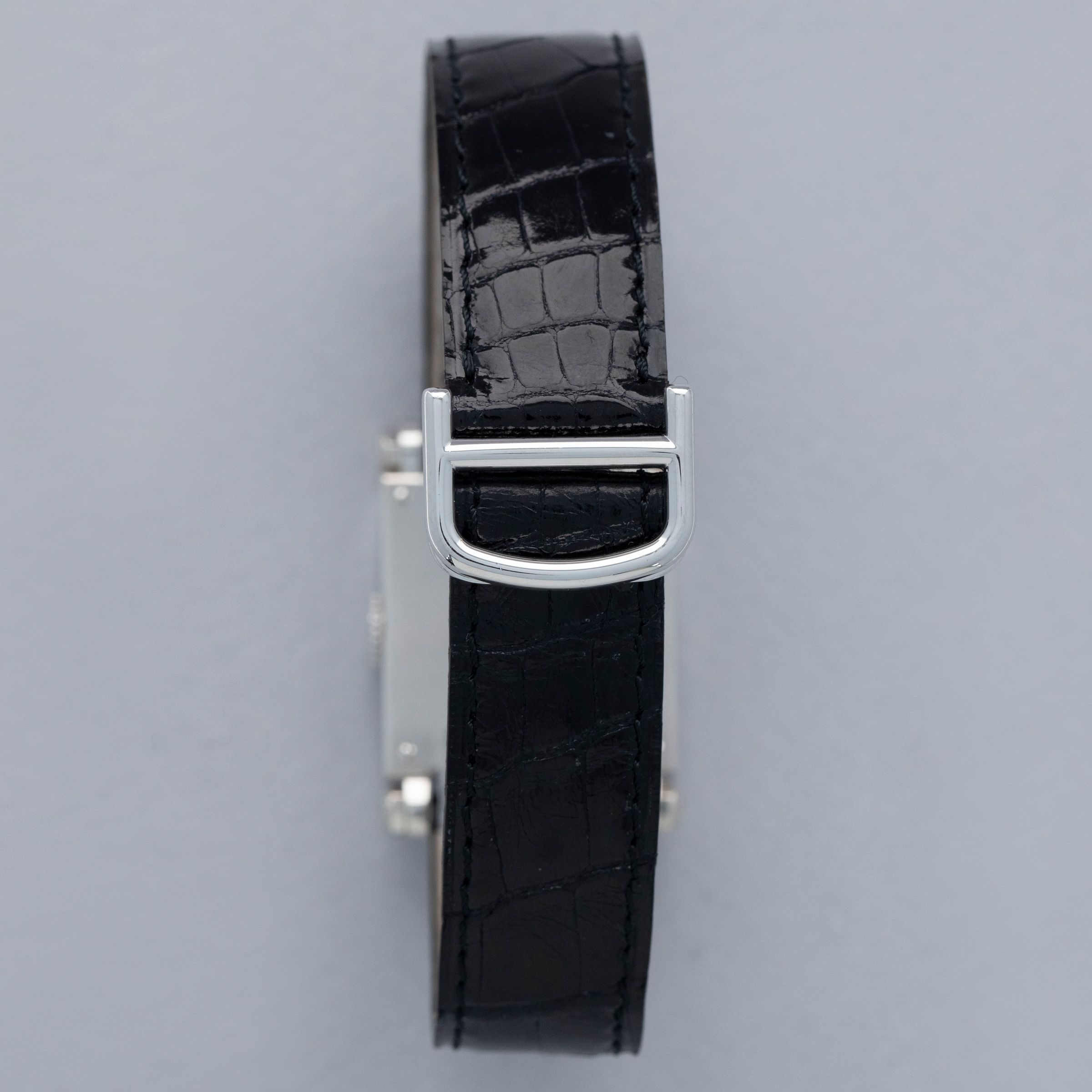 Cartier Rectangulaire A Pattes Vis Armurier 18k WG | Auctions