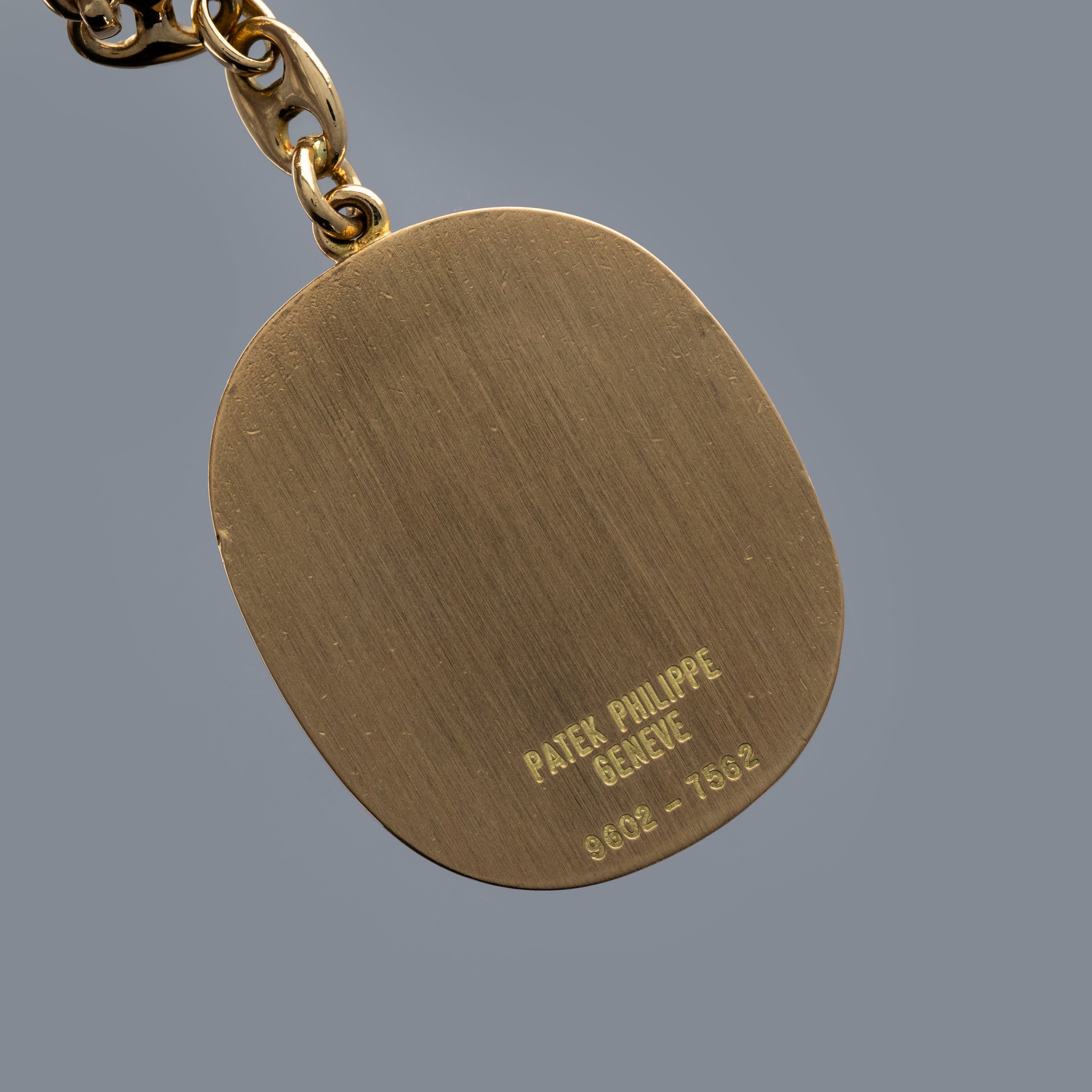 Patek Philippe Ellipse Keychain 9602J 18K YG | Auctions | Loupe This