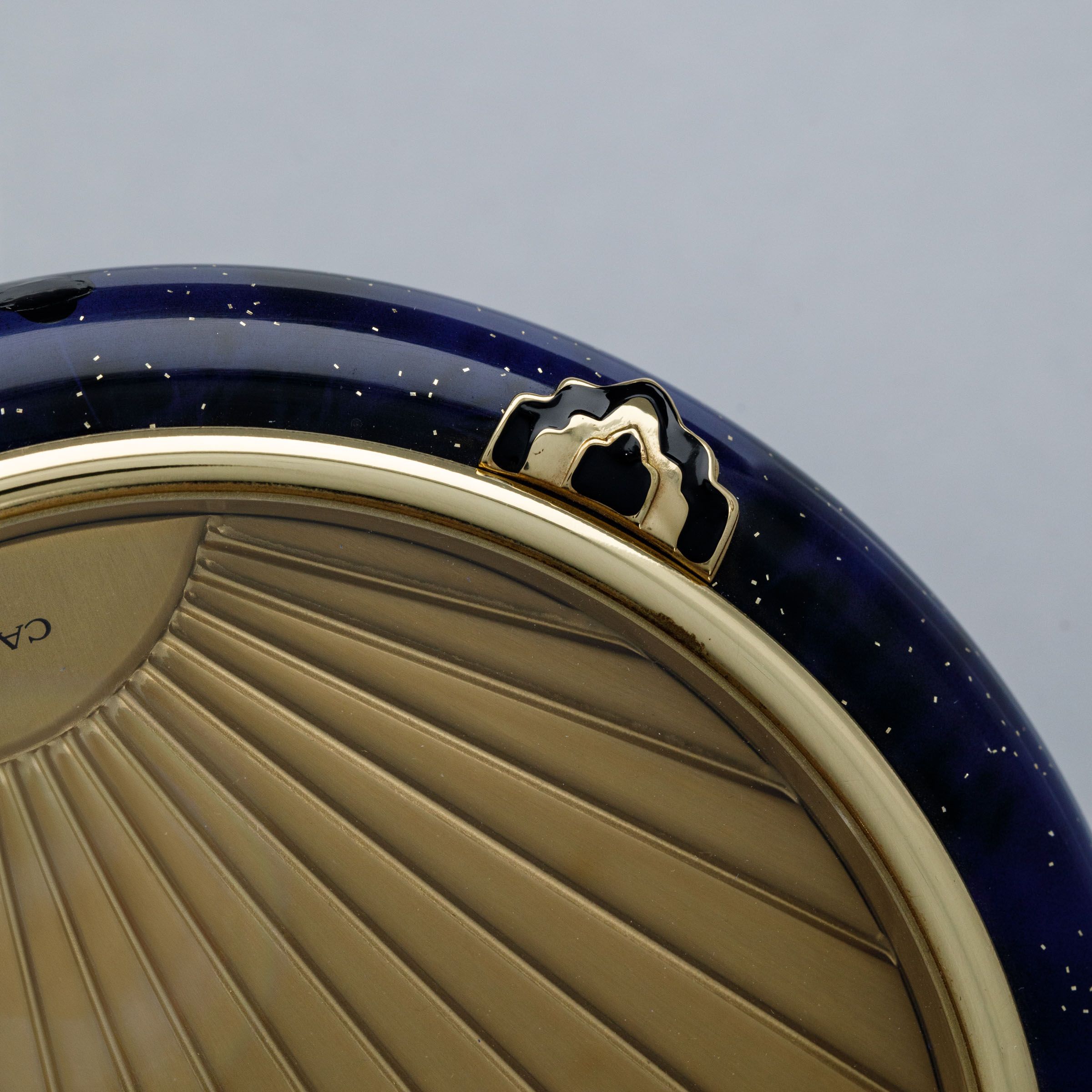 CARTIER MUST DE CARTIER GILT AND BLUE LACQUER DESK CLOCK