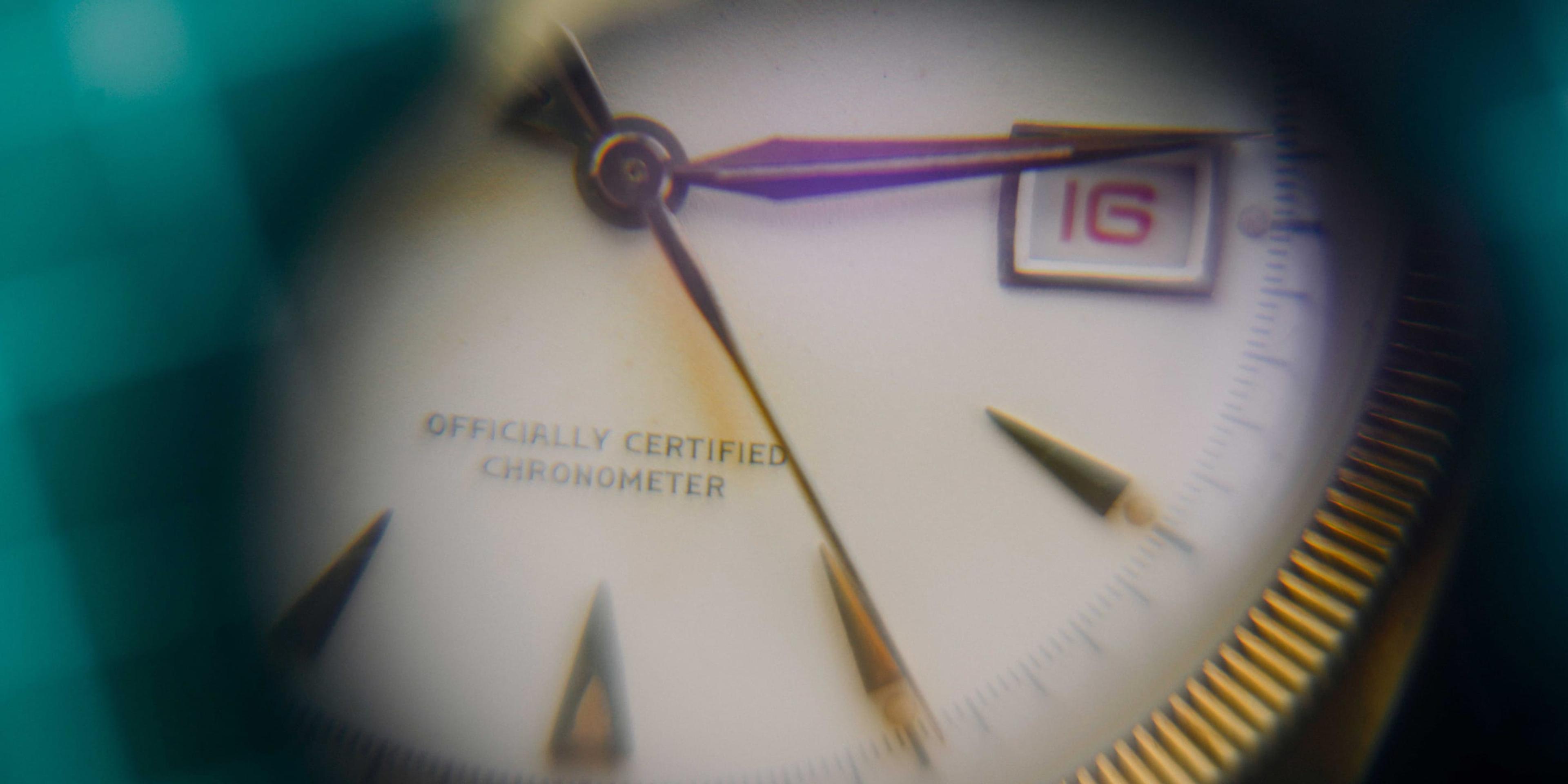 A close up of an Art Deco style watch face