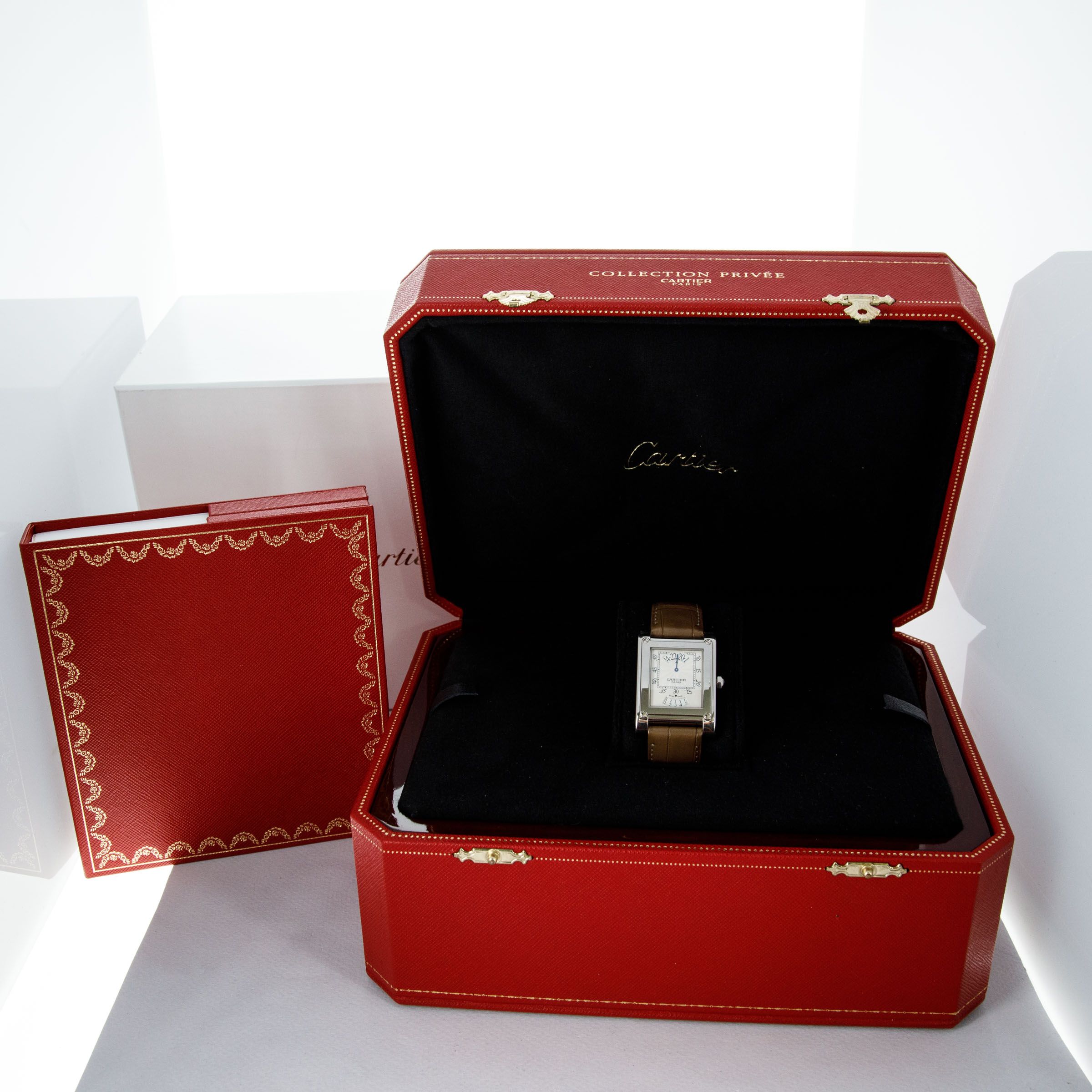 CARTIER CPCP TANK A VIS WANDERING HOURS 2554 18K WG | Auctions