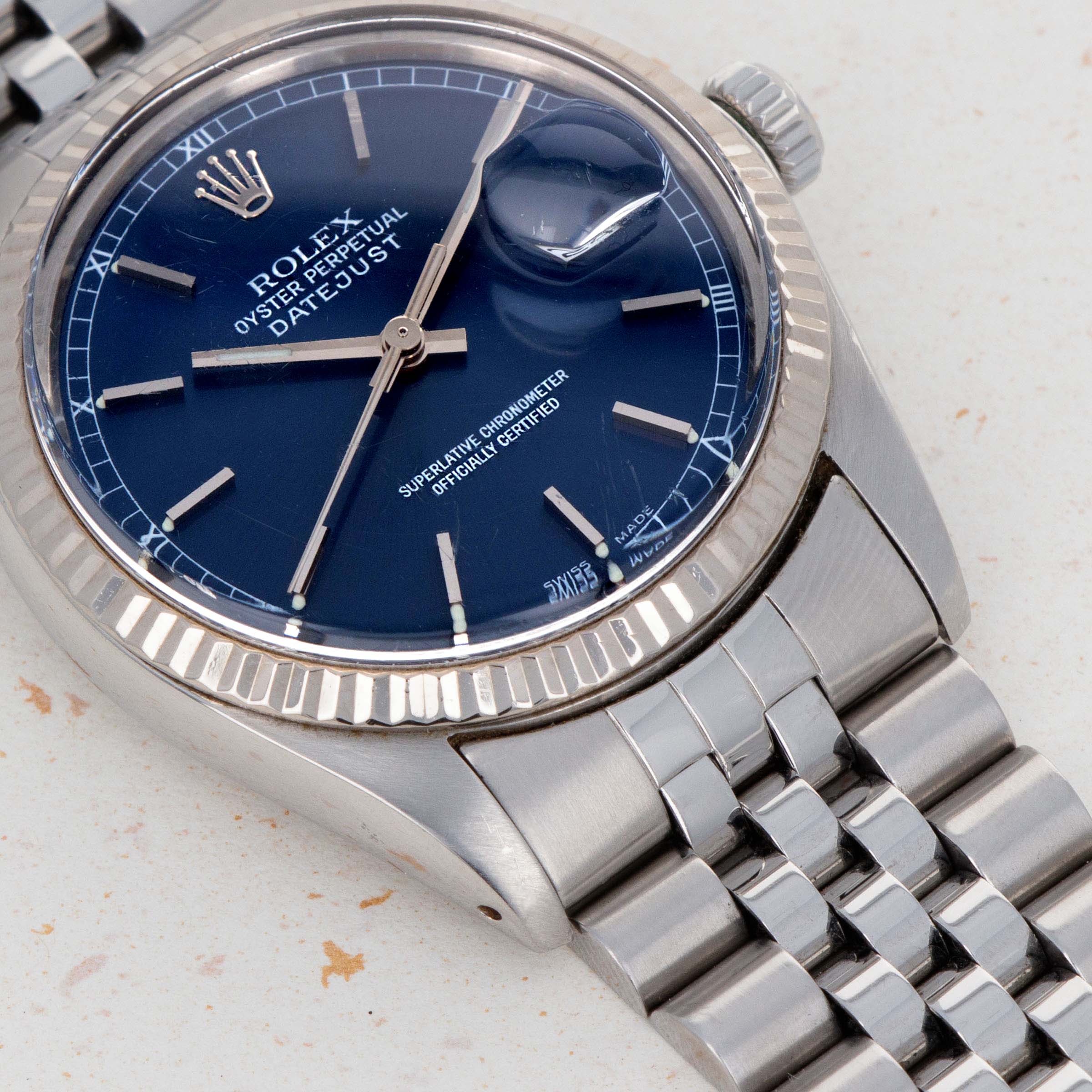 Rolex Datejust 16014 Blue Dial with Guarantee Certificate Auctions Loupe This