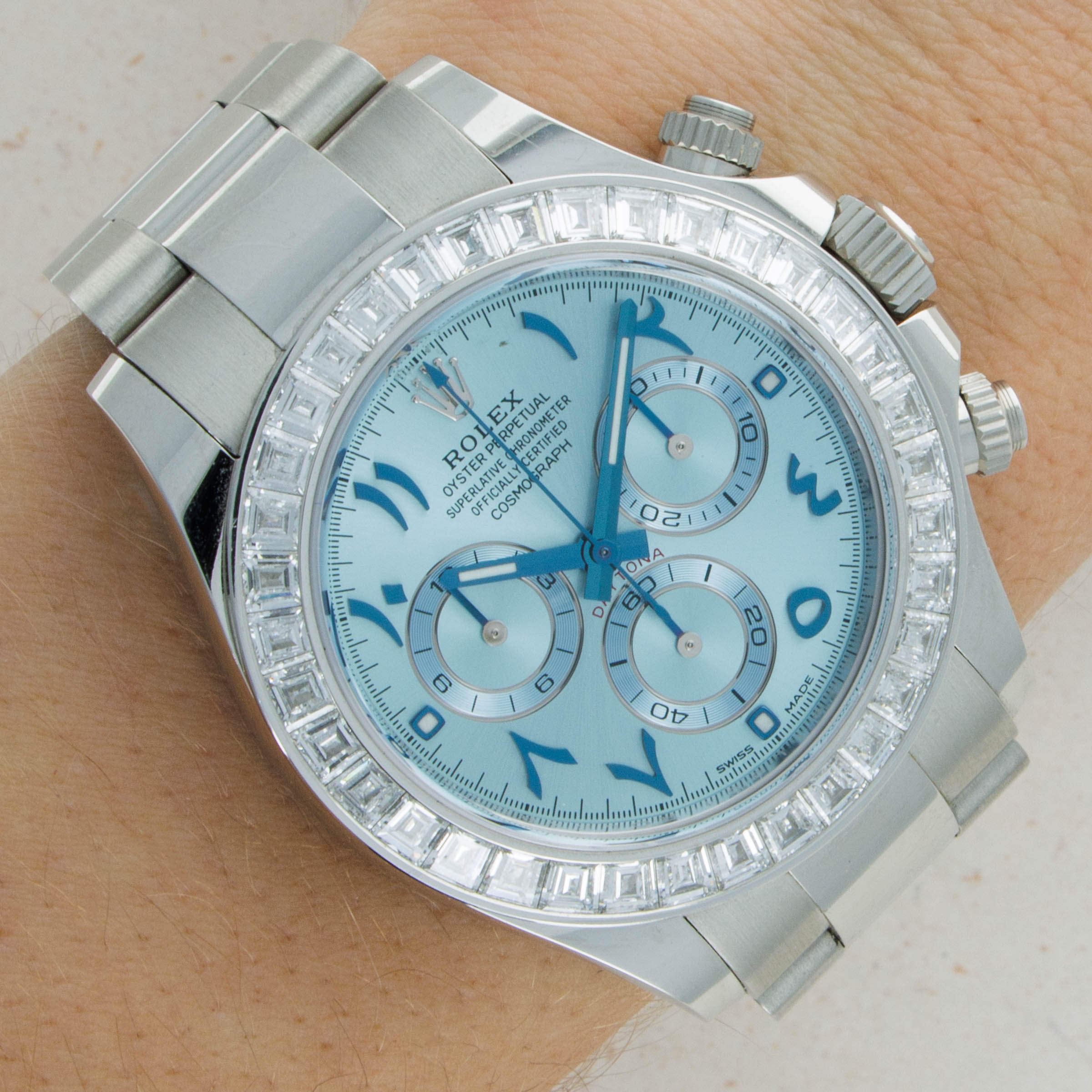 Rolex Daytona 116576TBR Platinum Baguette Diamond Bezel Arabic Ice Blue  Dial | Auctions | Loupe This