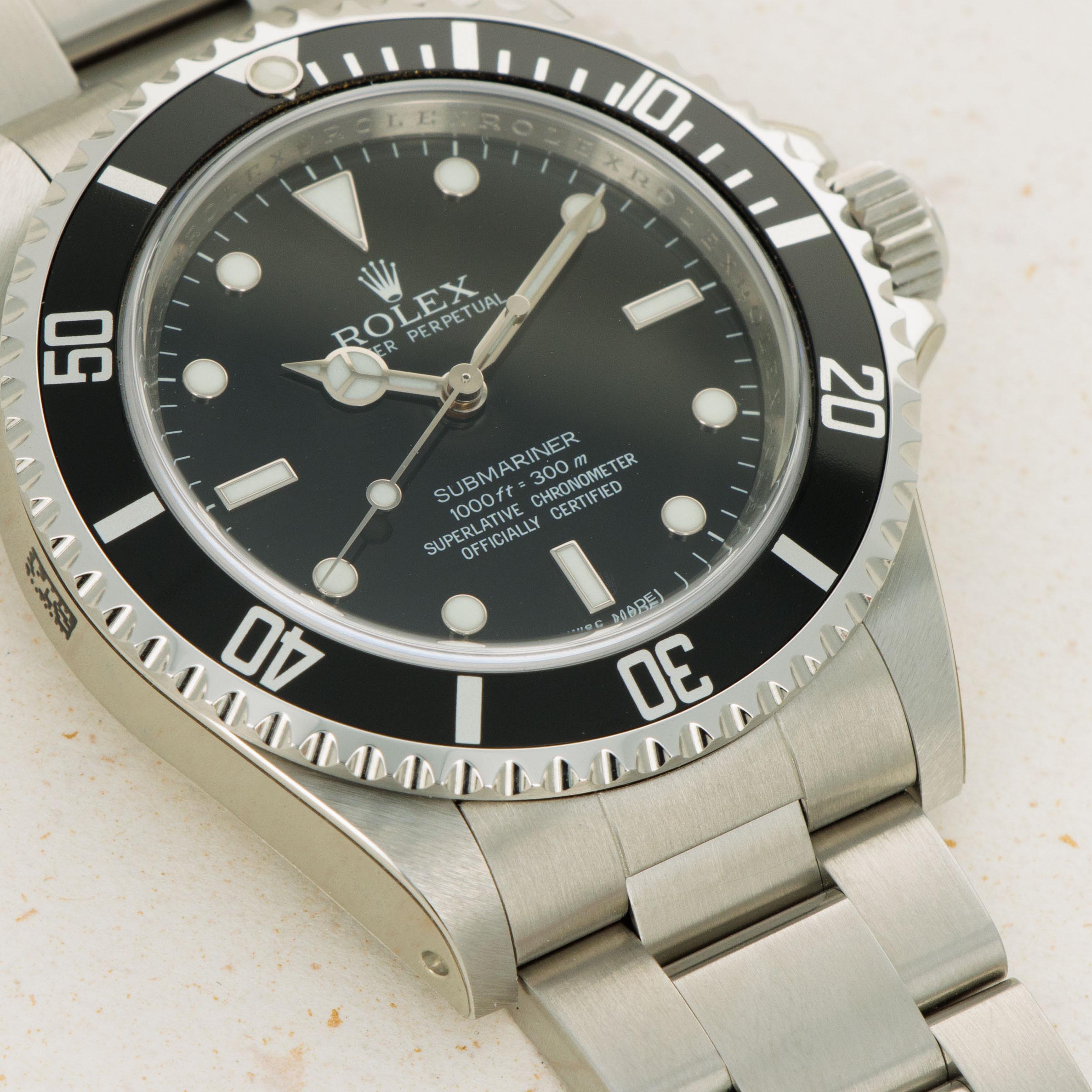 Rolex Submariner Non Date 14060M New Old Stock Sultanate of Oman Auctions Loupe This