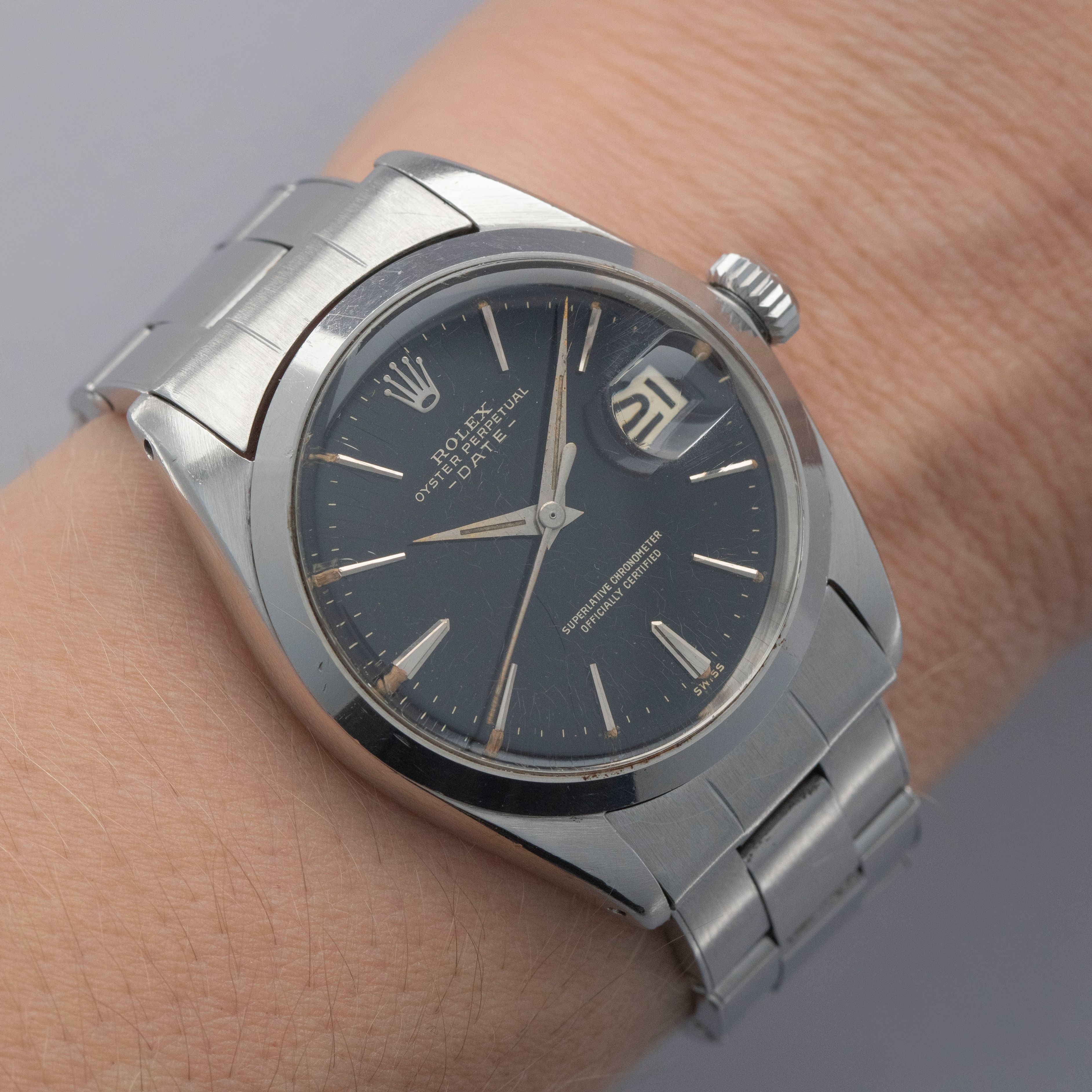 Rolex Oyster Perpetual Date 1500 Black Gilt Dial | Auctions