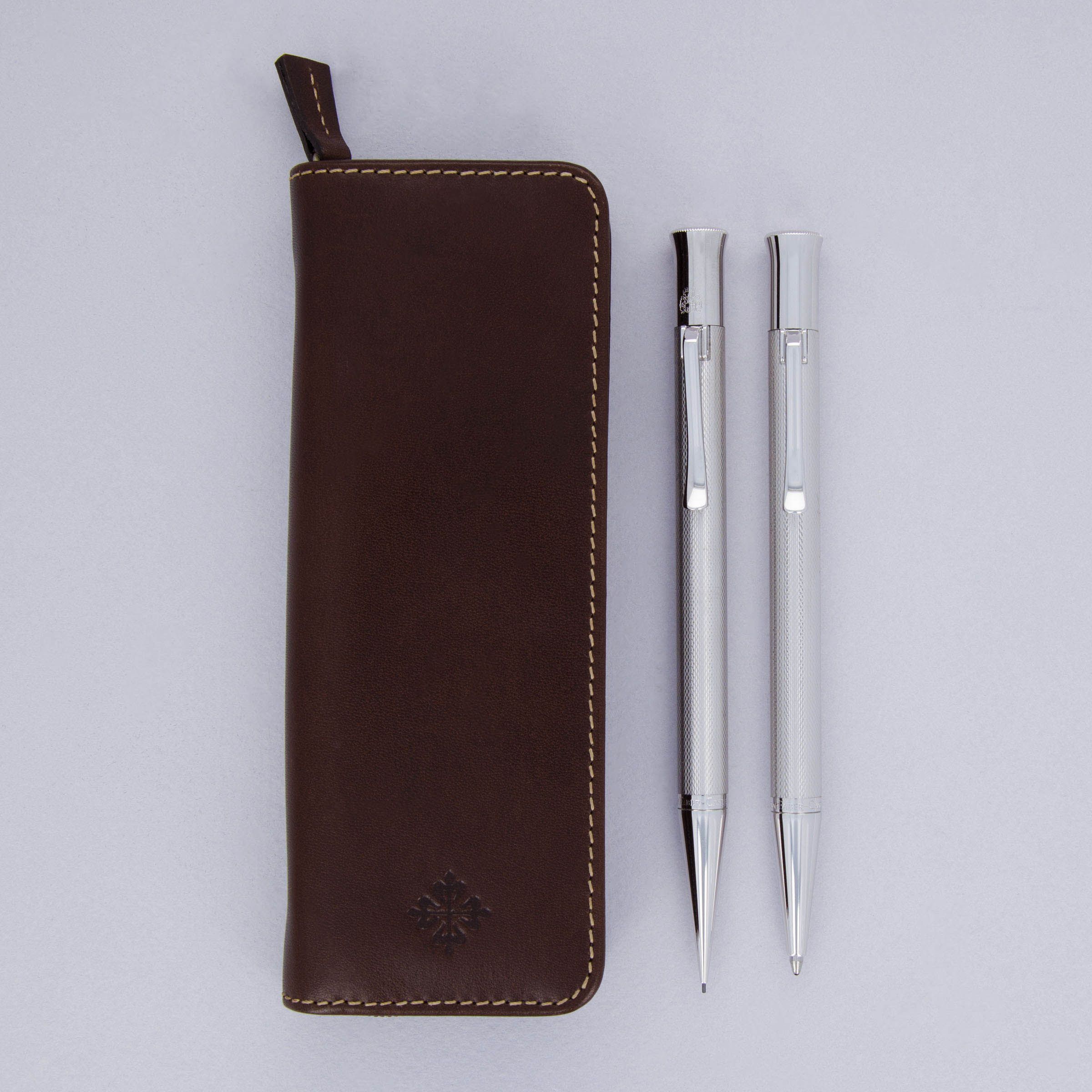Patek Philippe Watch Winder, Desk Magnifier, Pen and Pencil Set