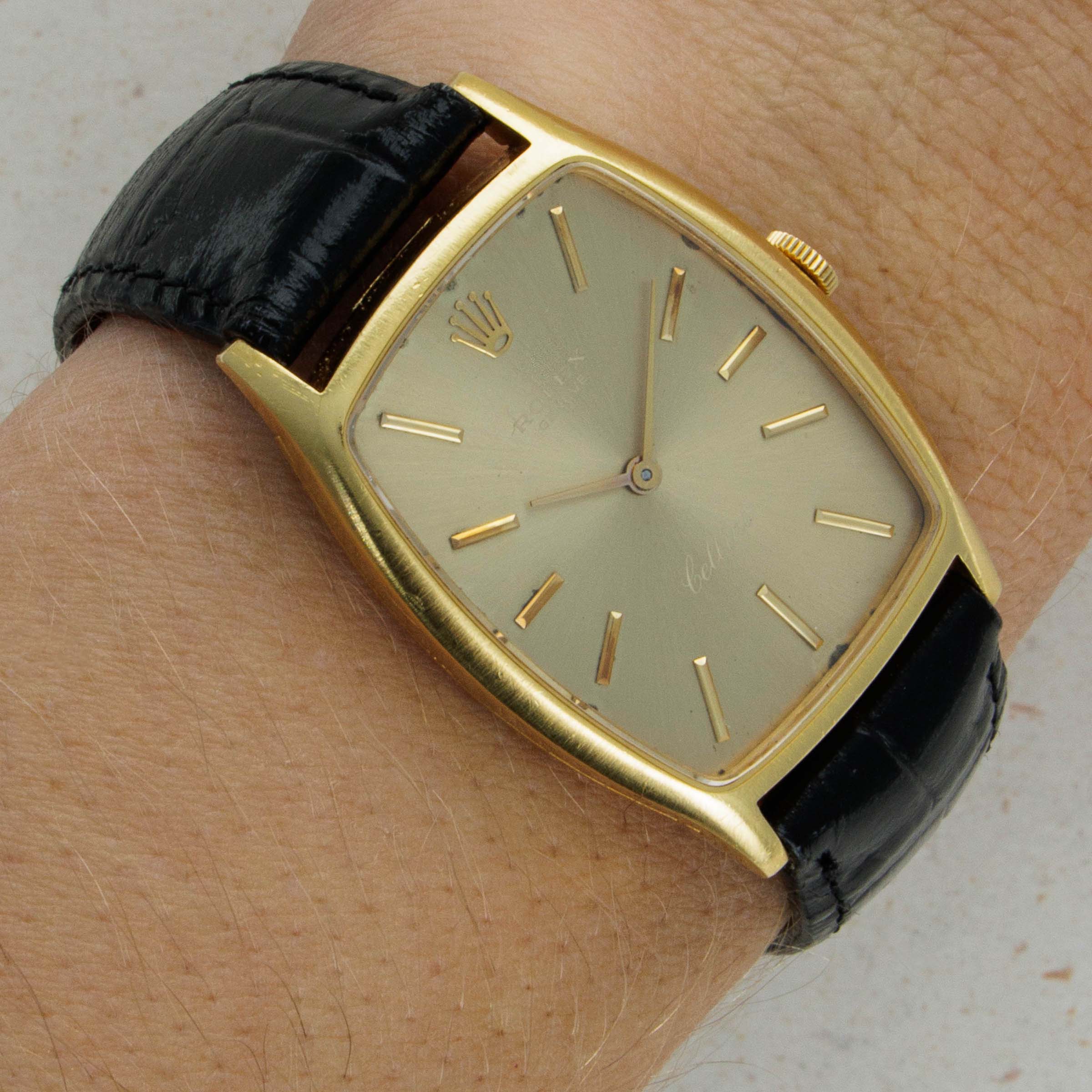 Rolex Cellini 3807 Tonneau 18k YG Auctions Loupe This