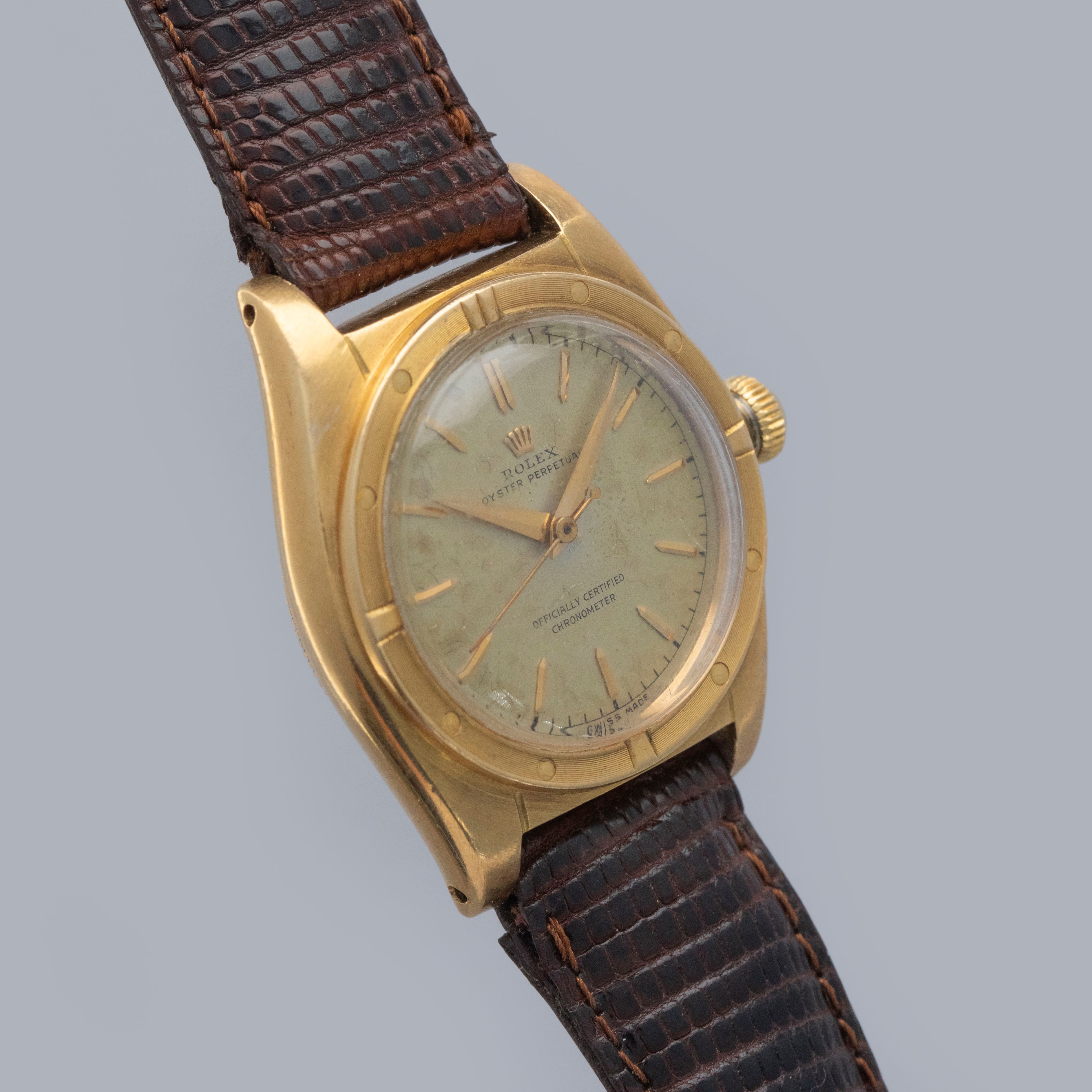 Rolex Oyster Perpetual Bubbleback 5015 18k YG | Auctions | Loupe This