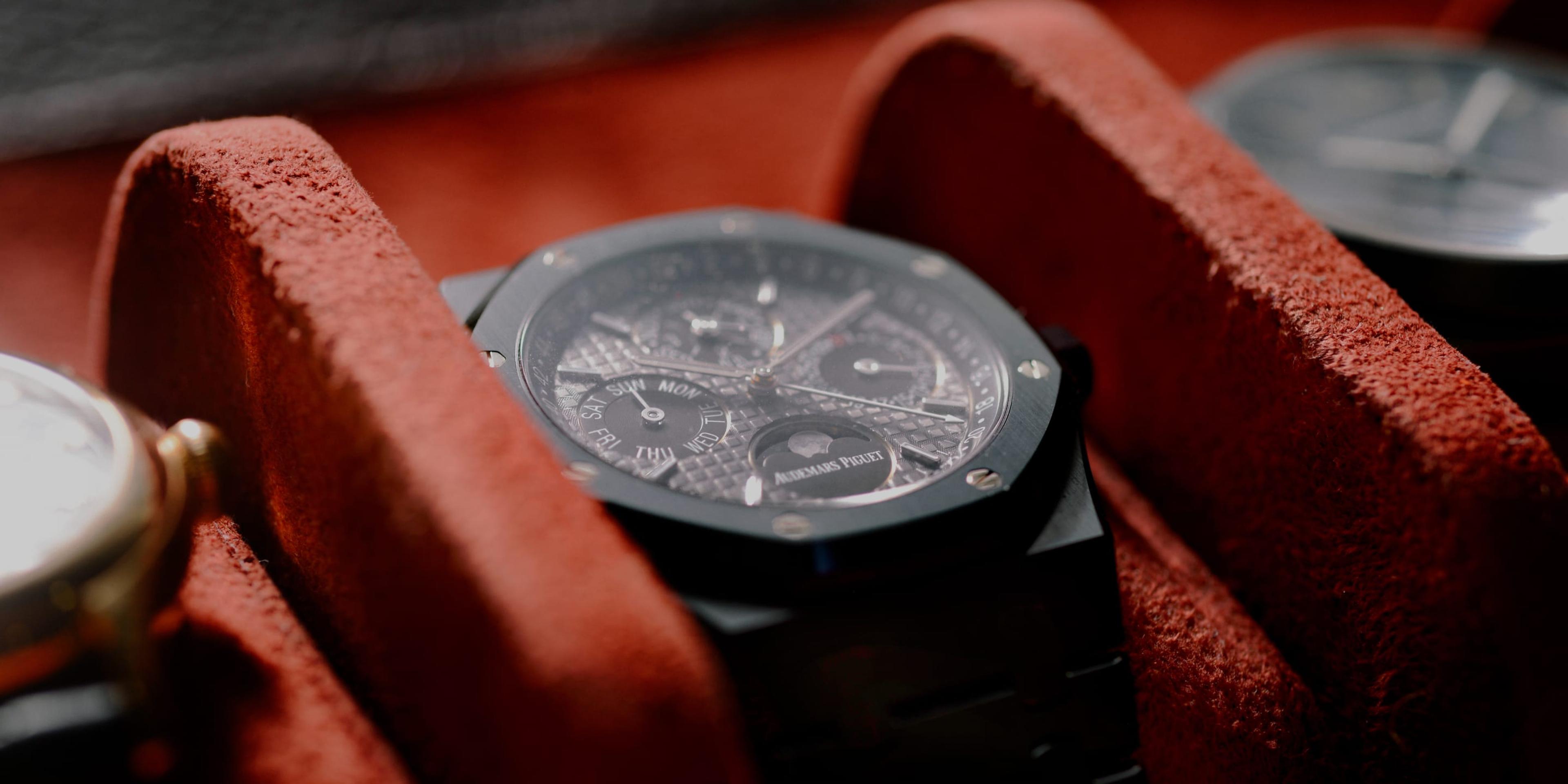 A watch nestled in a red box