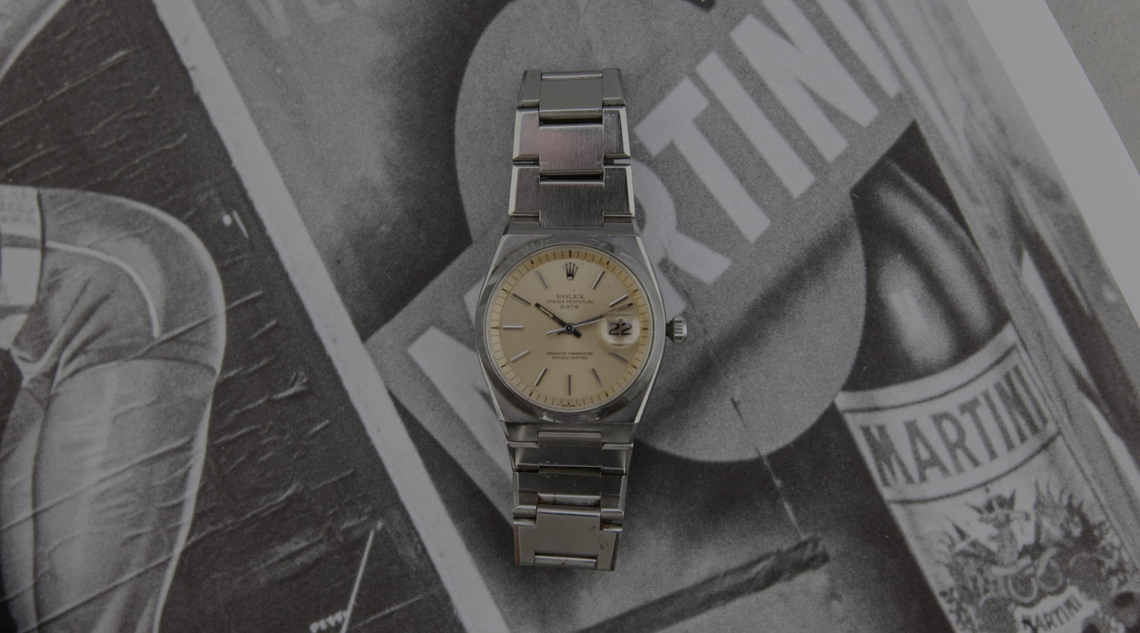 Watch on top of a newspaper