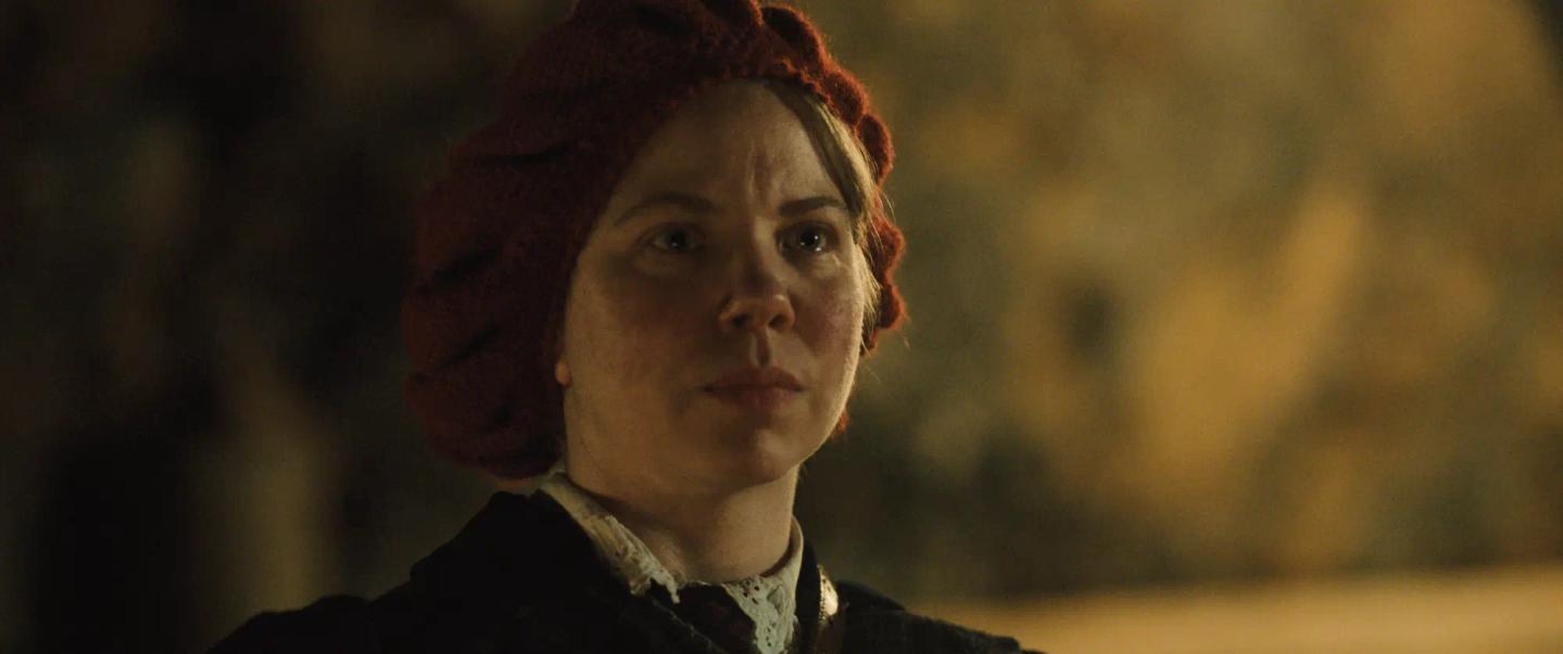 a man with a red headdress