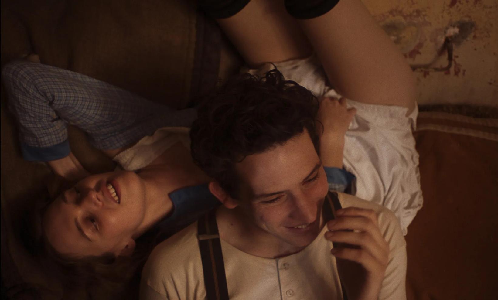 a man and woman lying on the floor