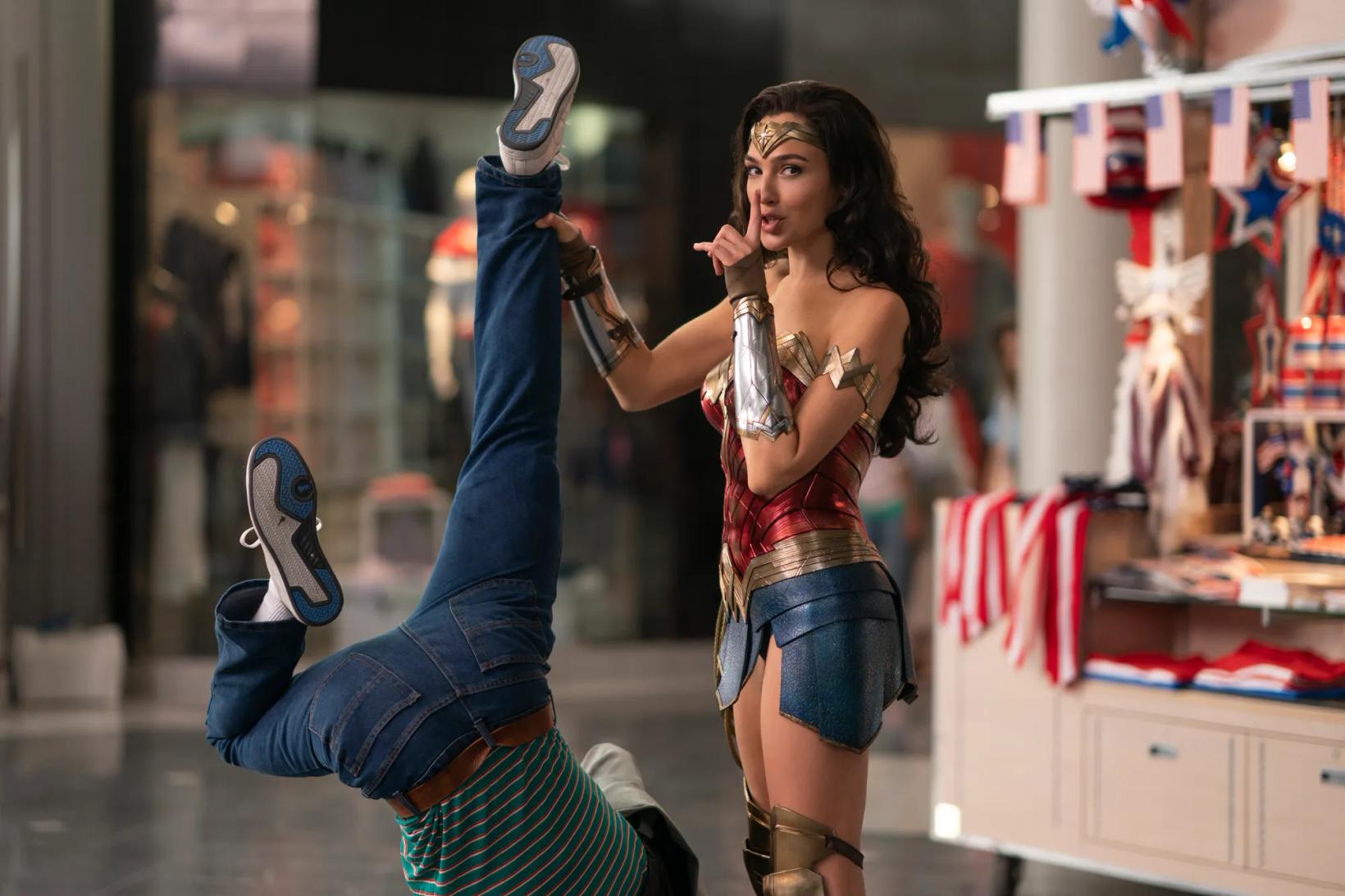 Gal Gadot holding her leg up