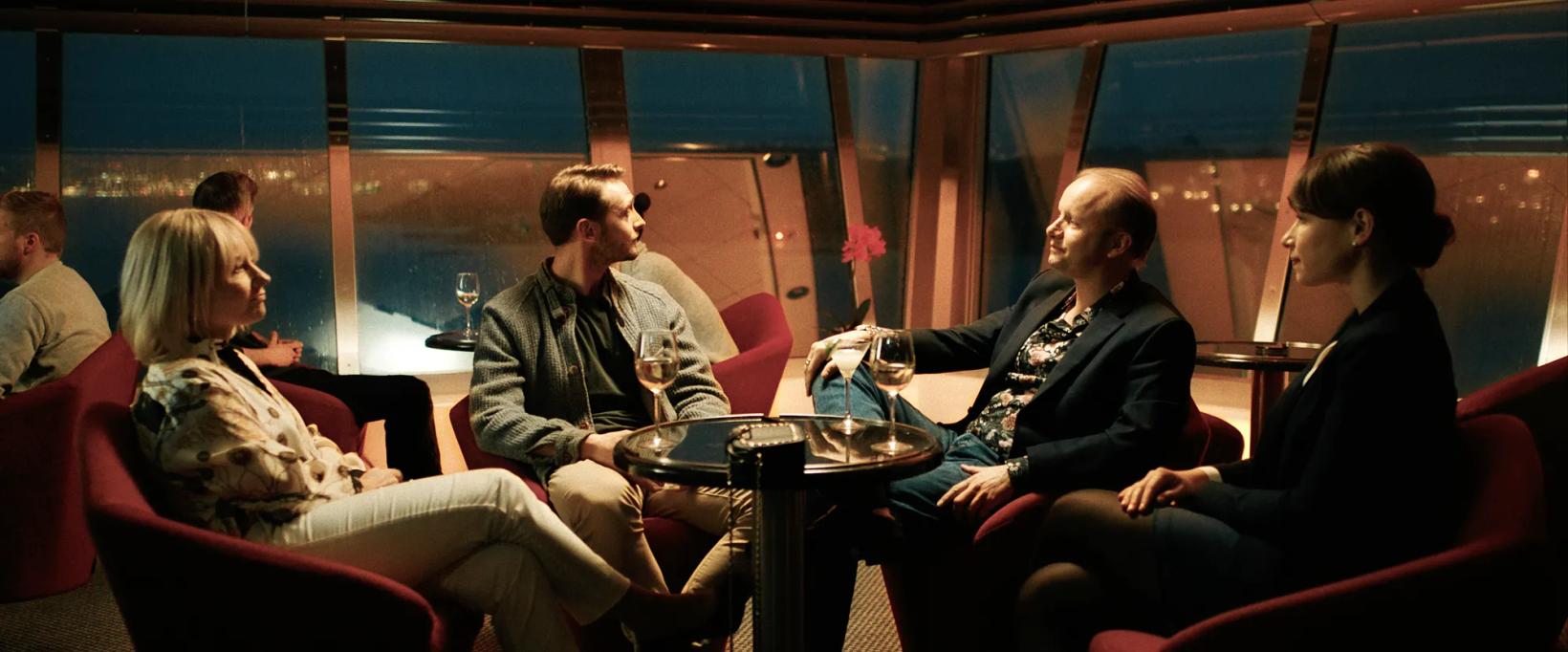 a group of people sitting in chairs