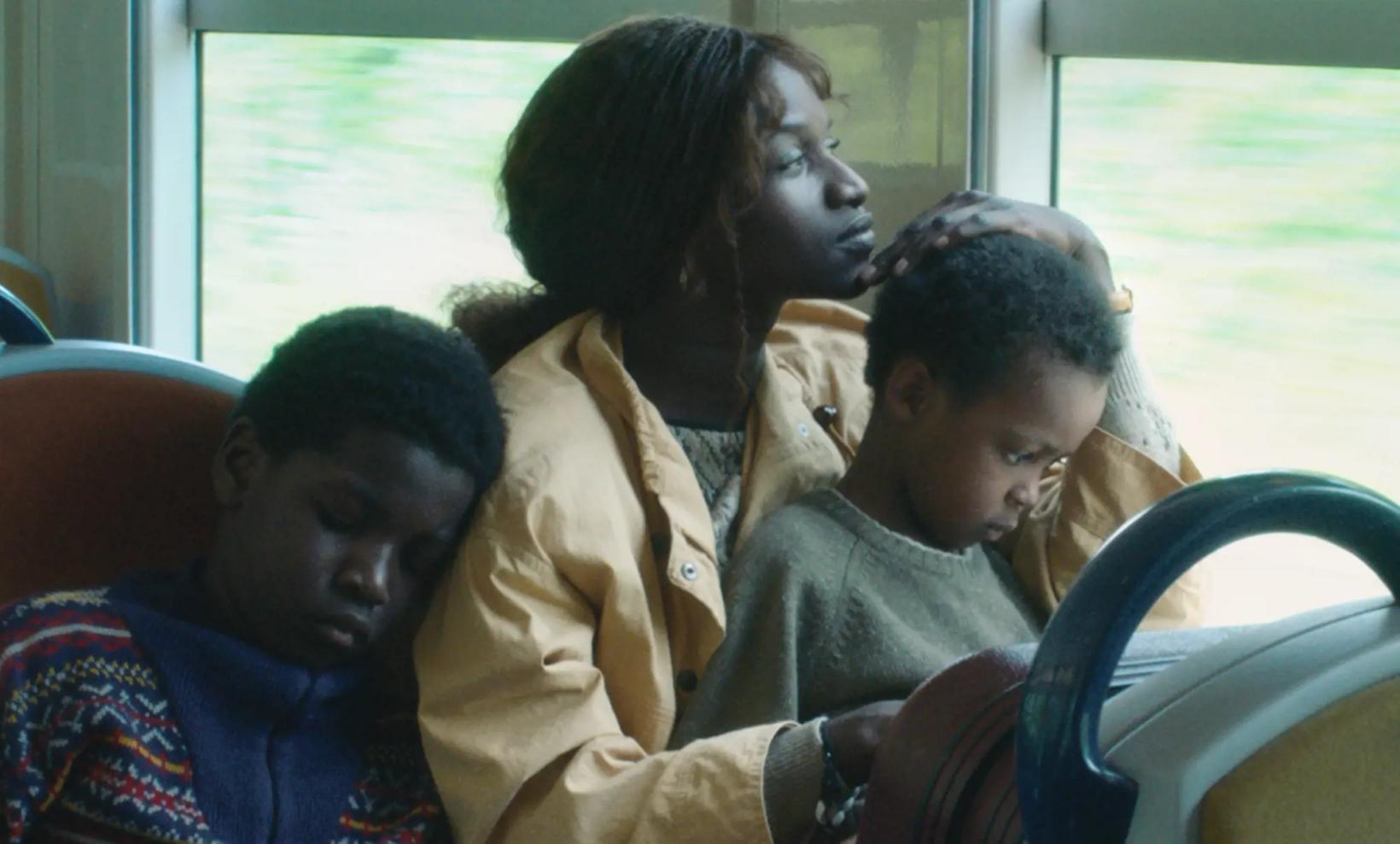 a group of people sitting on a bus