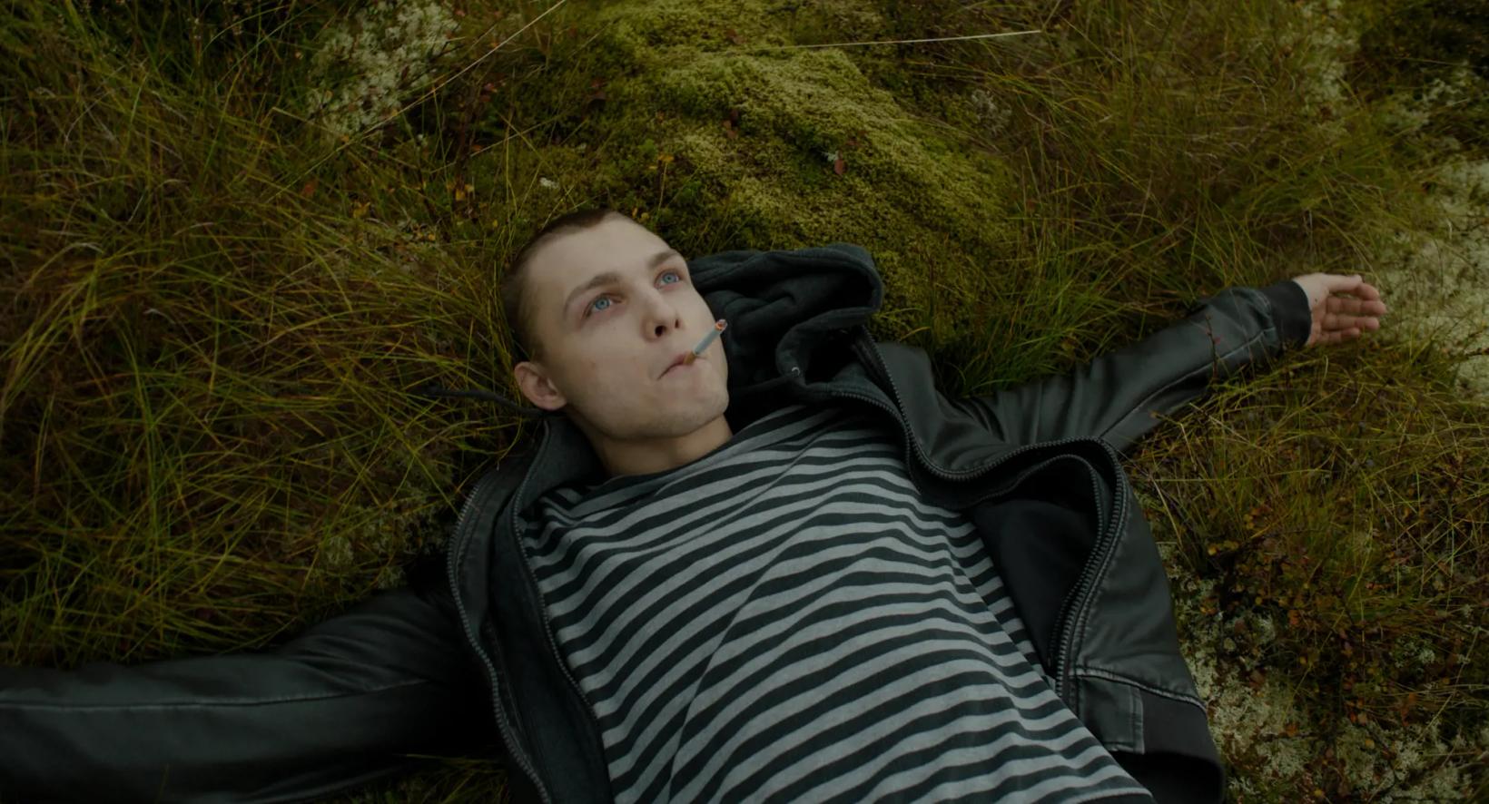 a person lying in the grass