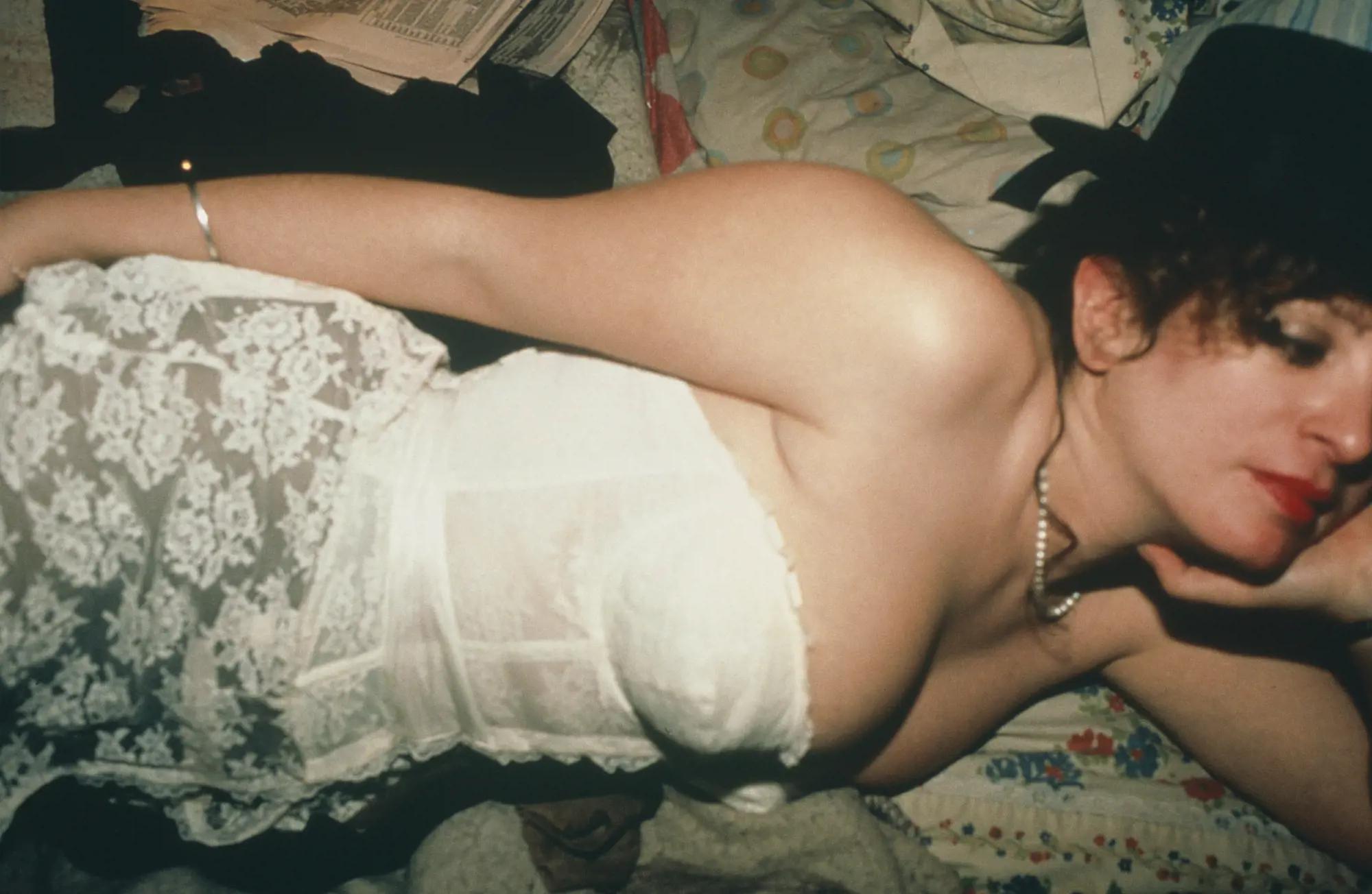 a person lying on a bed