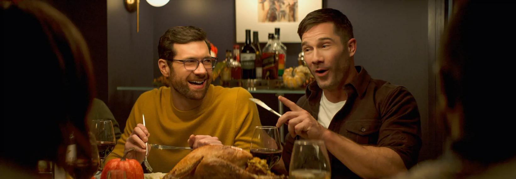 Luke Macfarlane, Billy Eichner are posing for a picture