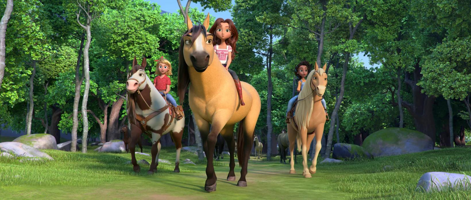 a group of people riding horses
