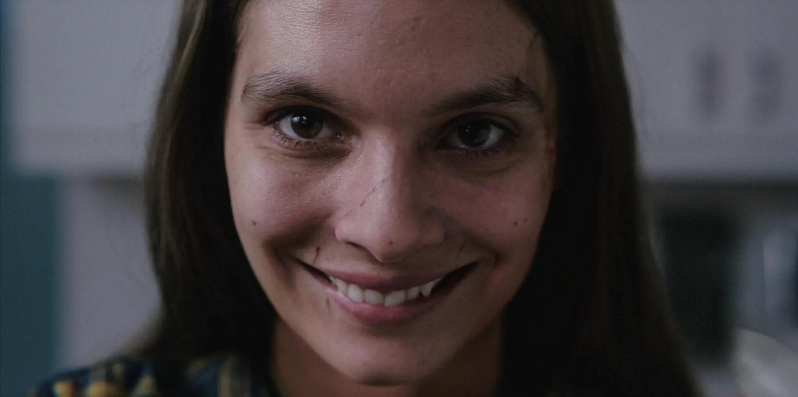 a close up of a woman