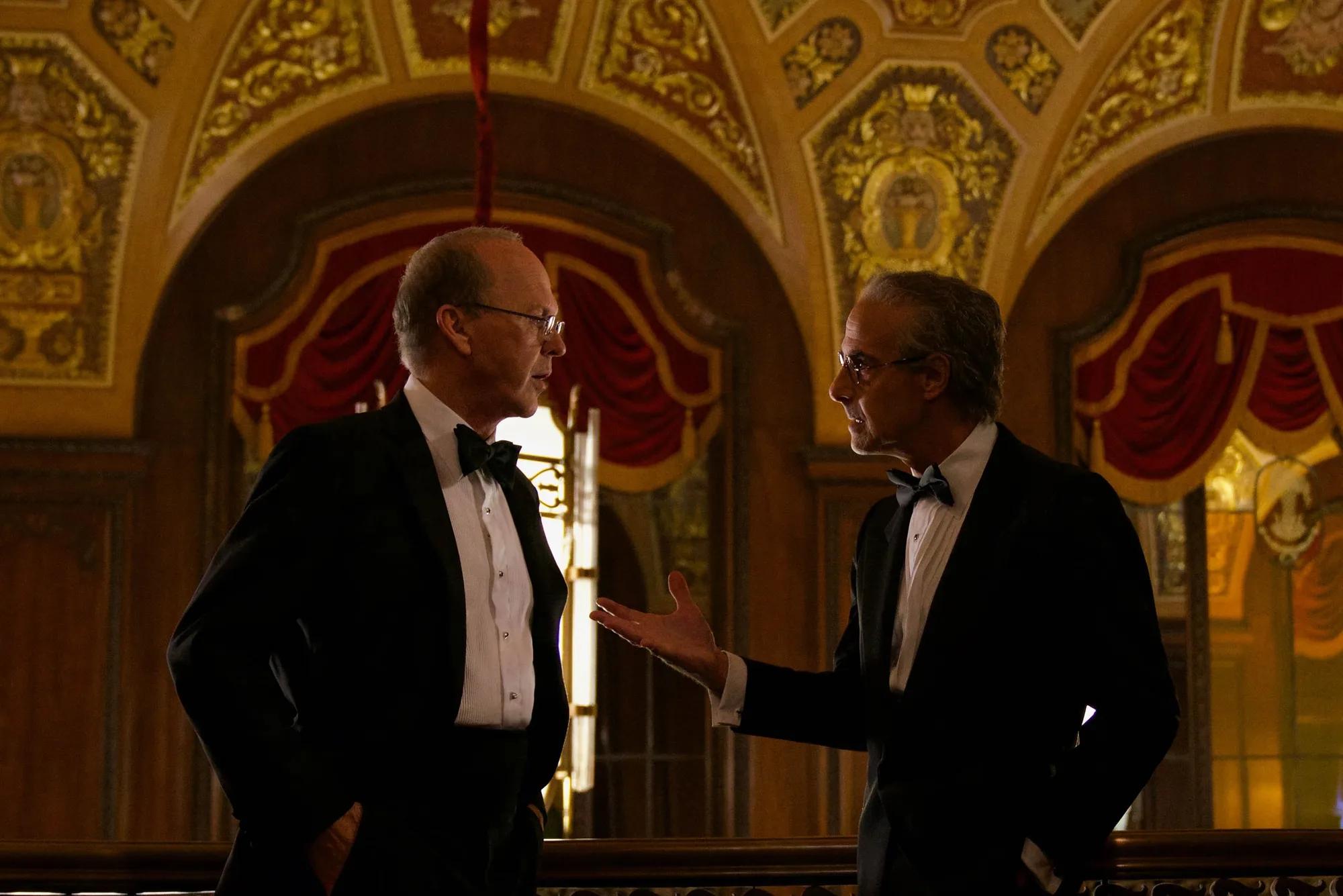 a couple of men in suits