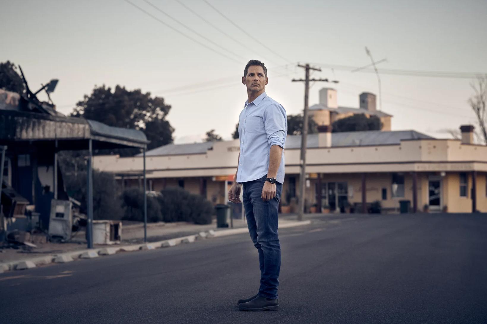 a man standing on a street