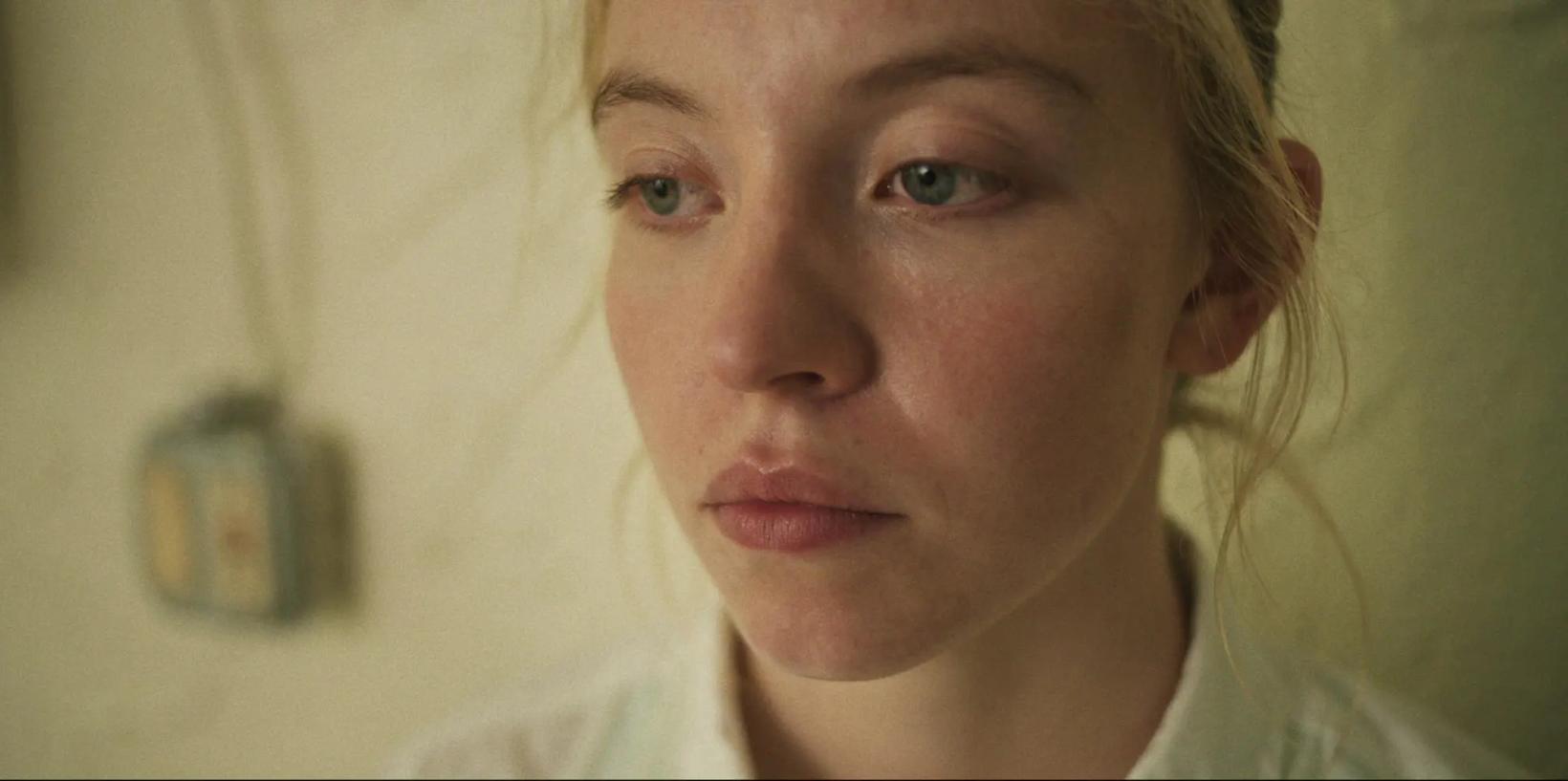 a woman looking at the camera