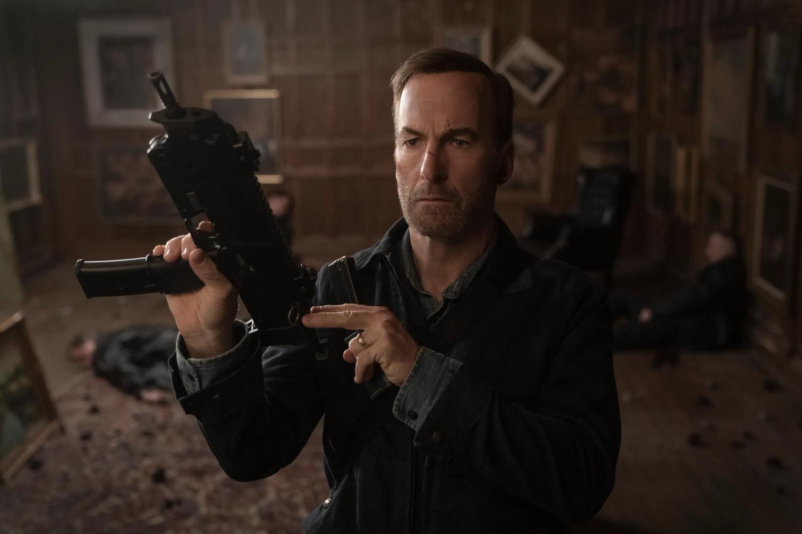 a man holding a gun