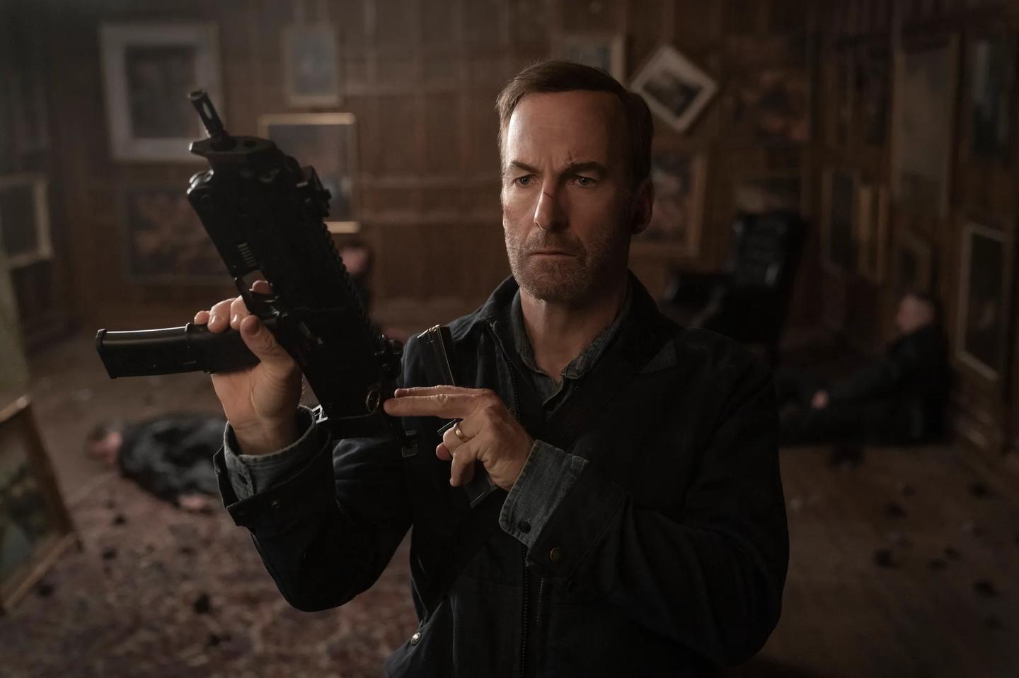 a man holding a gun