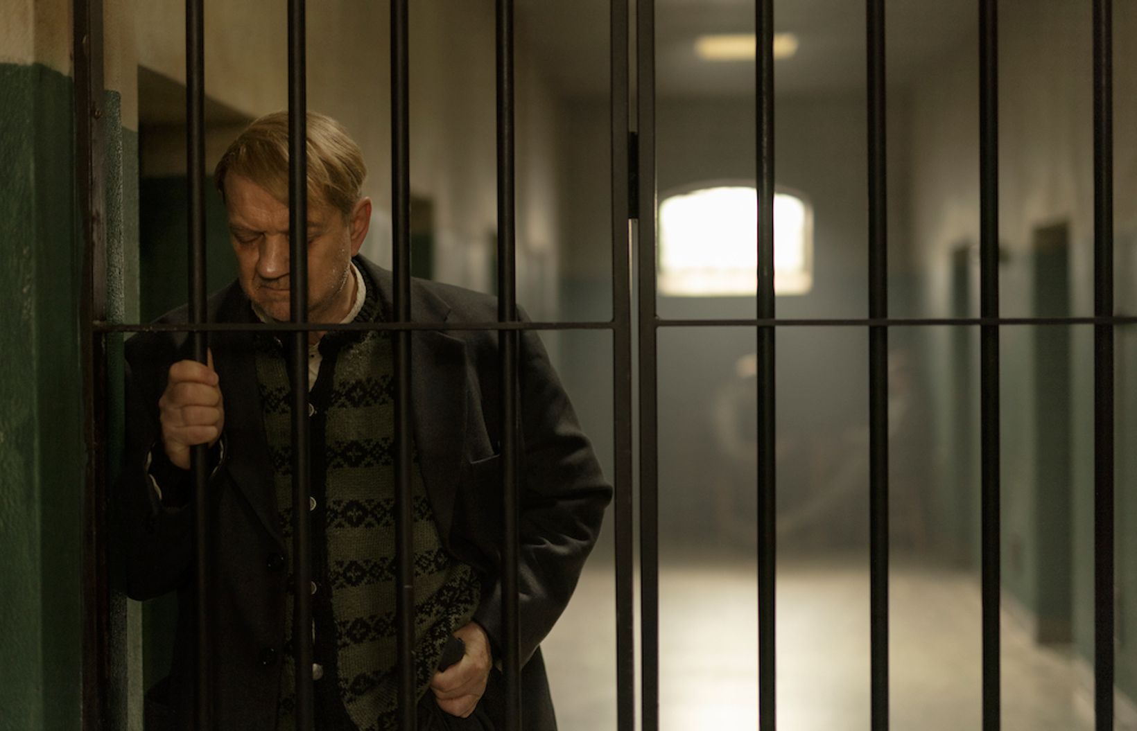 a person in a black coat