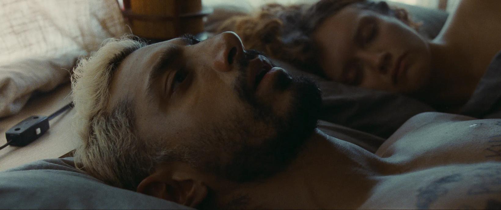 a man and woman lying down