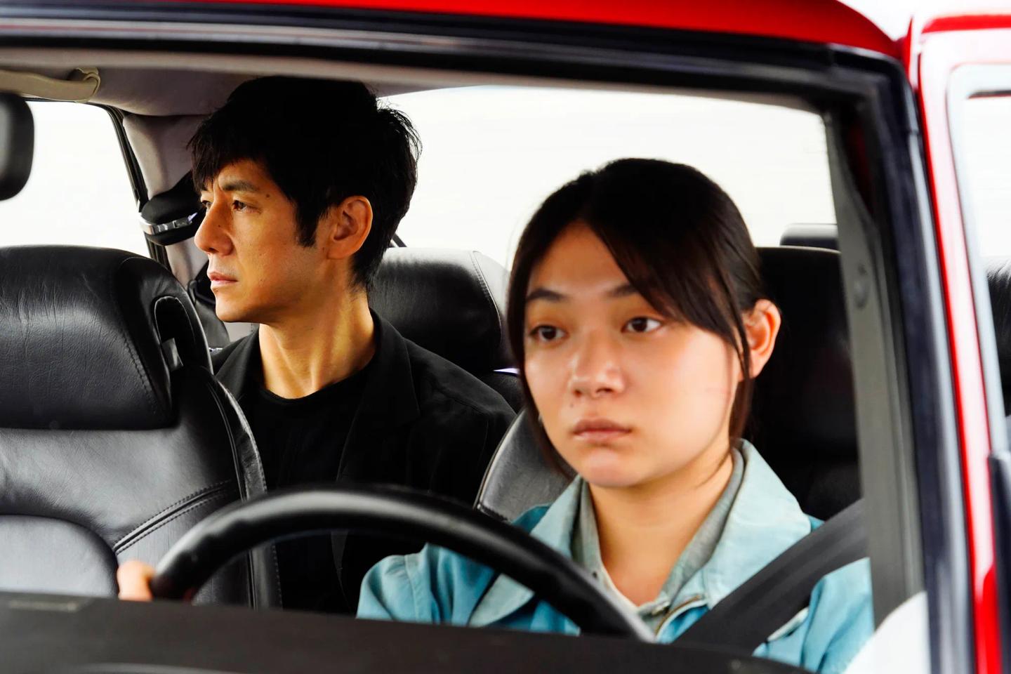 Hidetoshi Nishijima et al. in a car