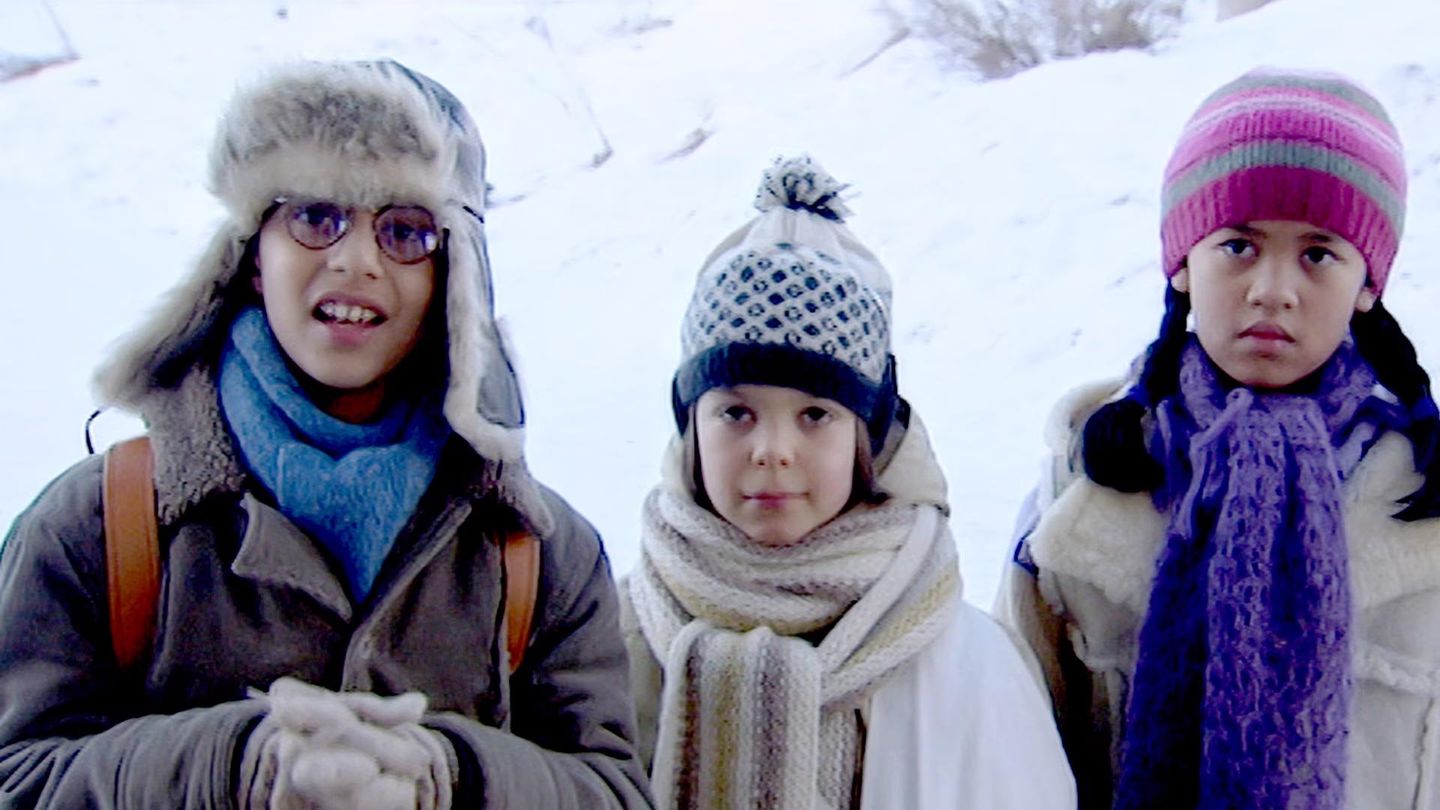 Atif, Nure og Akaya i Jul i Svingen