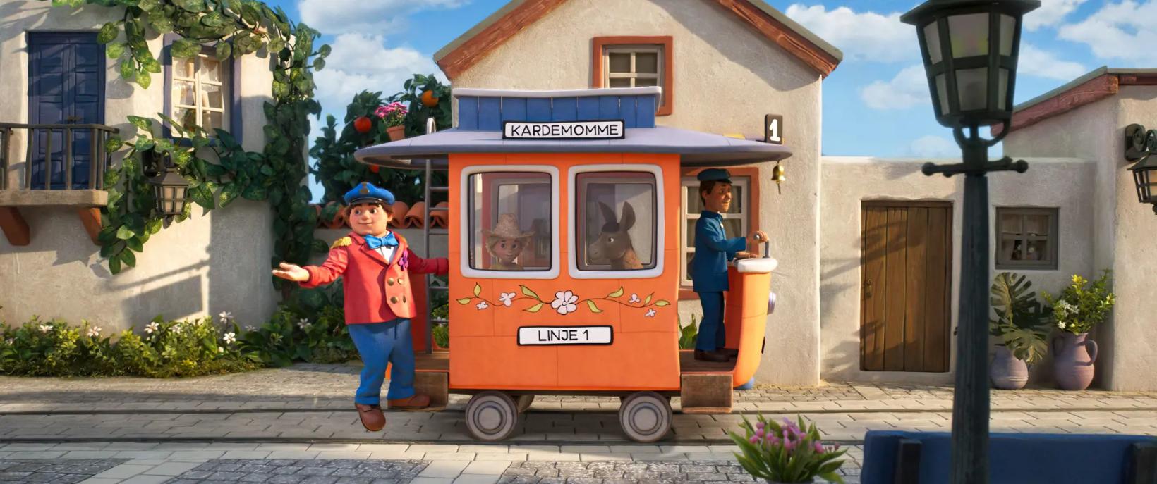 a toy house with a couple of people in it