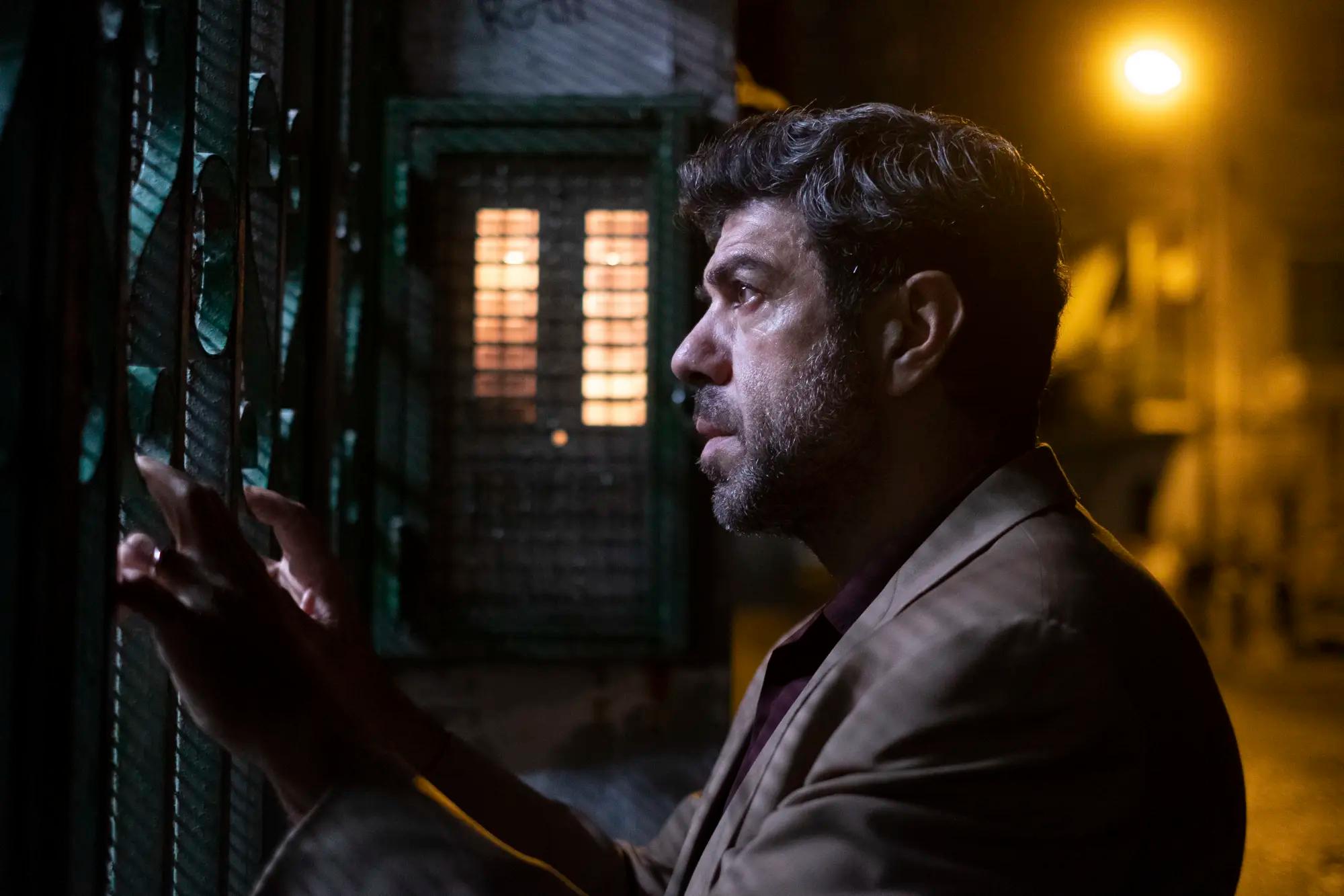 a man holding a black object