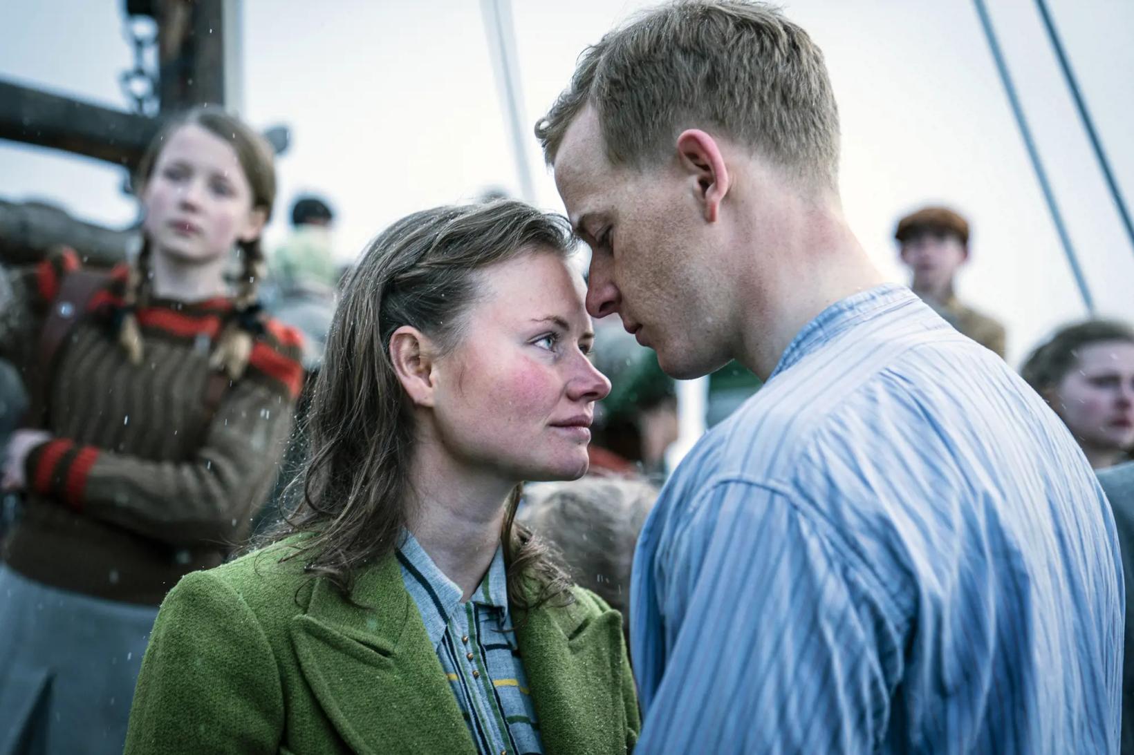a man and a woman talking