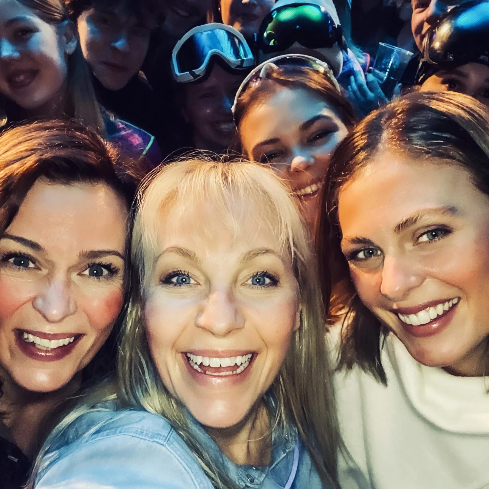 a group of people smiling