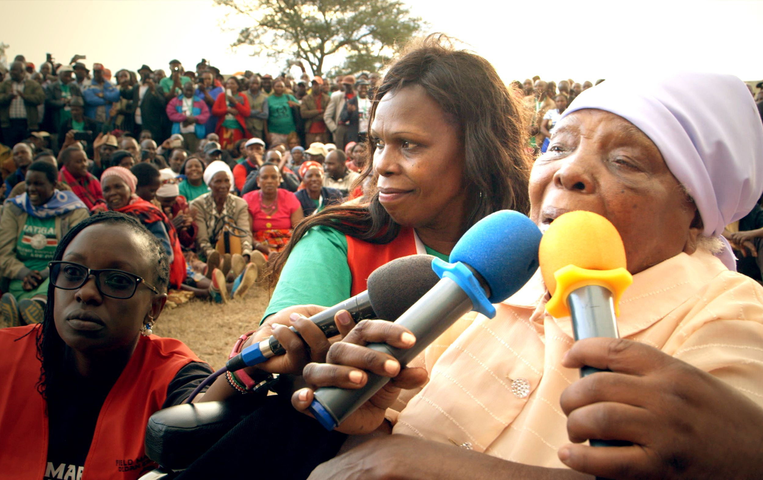 a person speaking into a microphone