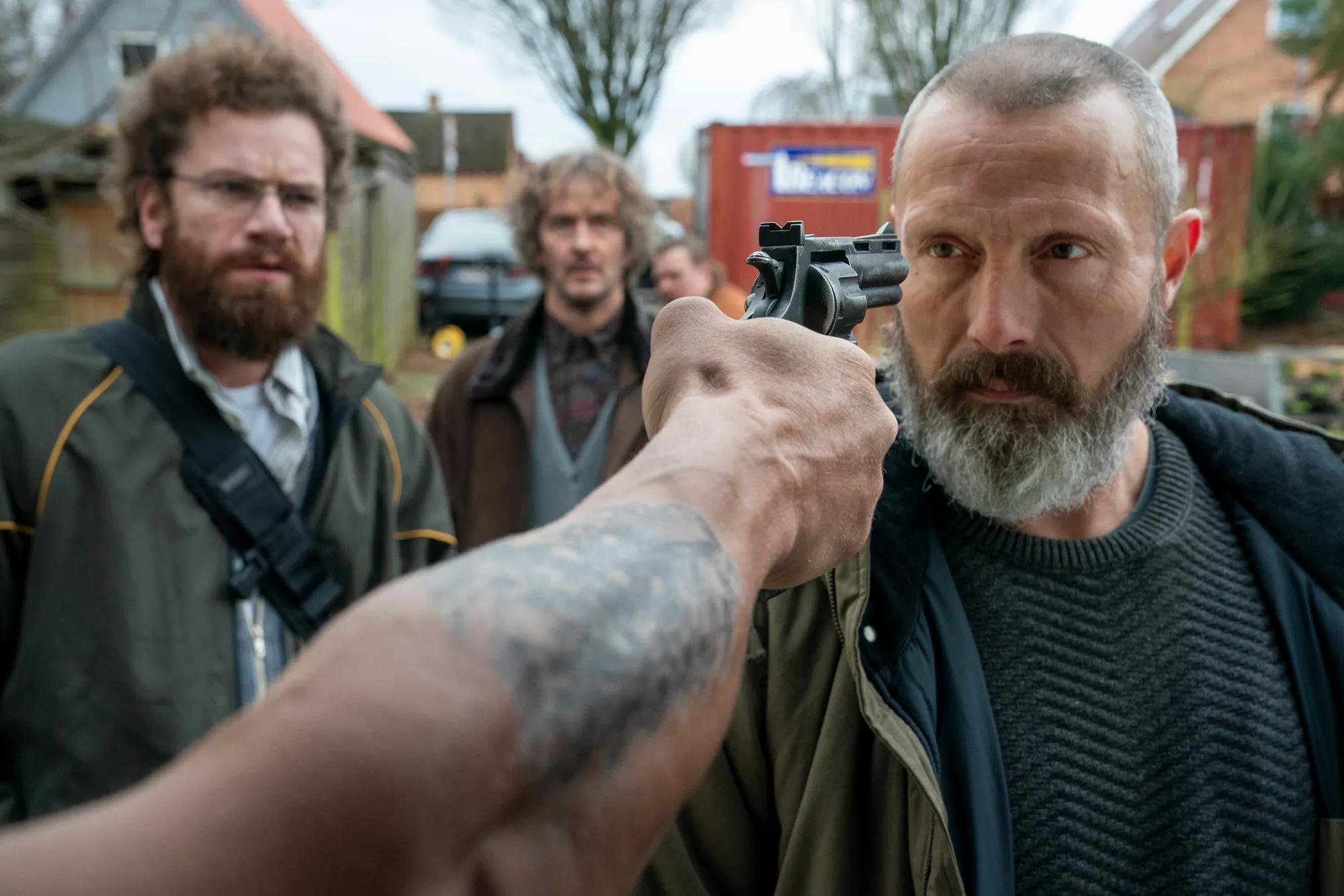 Nikolaj Lie Kaas holding a camera up to his face
